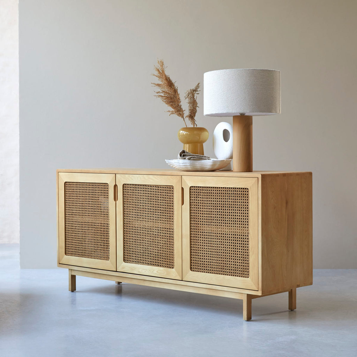 Tikamoon Luis sideboard in solid elm and cane, close-up of the woven cane panel