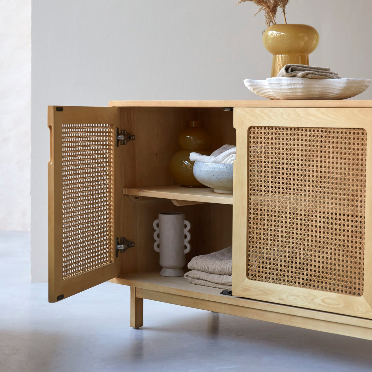 Tikamoon Luis sideboard in solid elm and cane, front view
