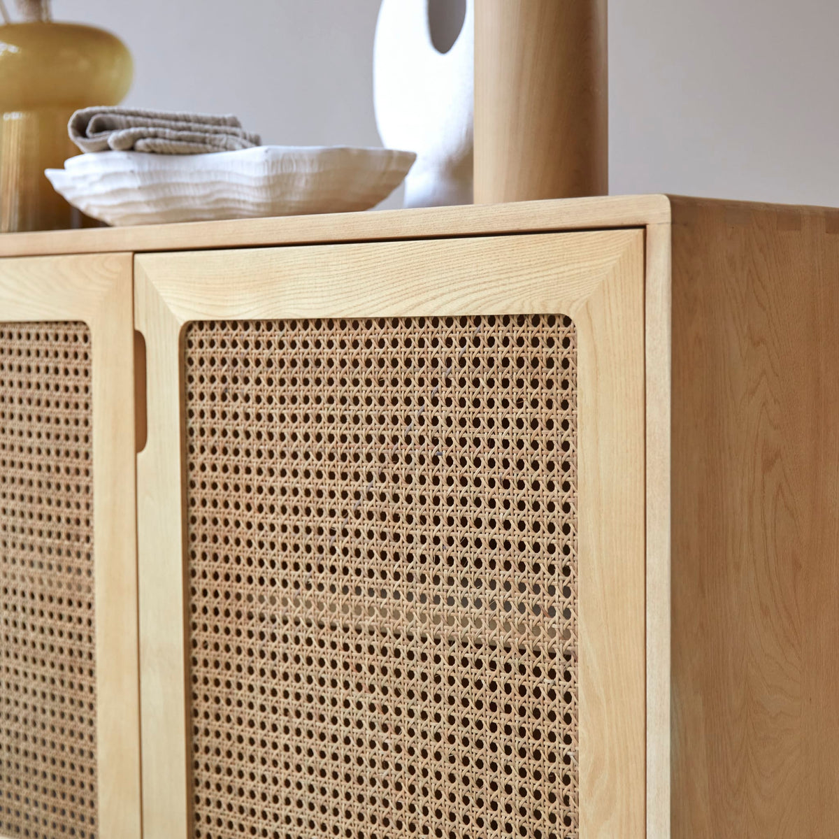 Tikamoon Luis sideboard in solid elm and cane, detail of the elm frame