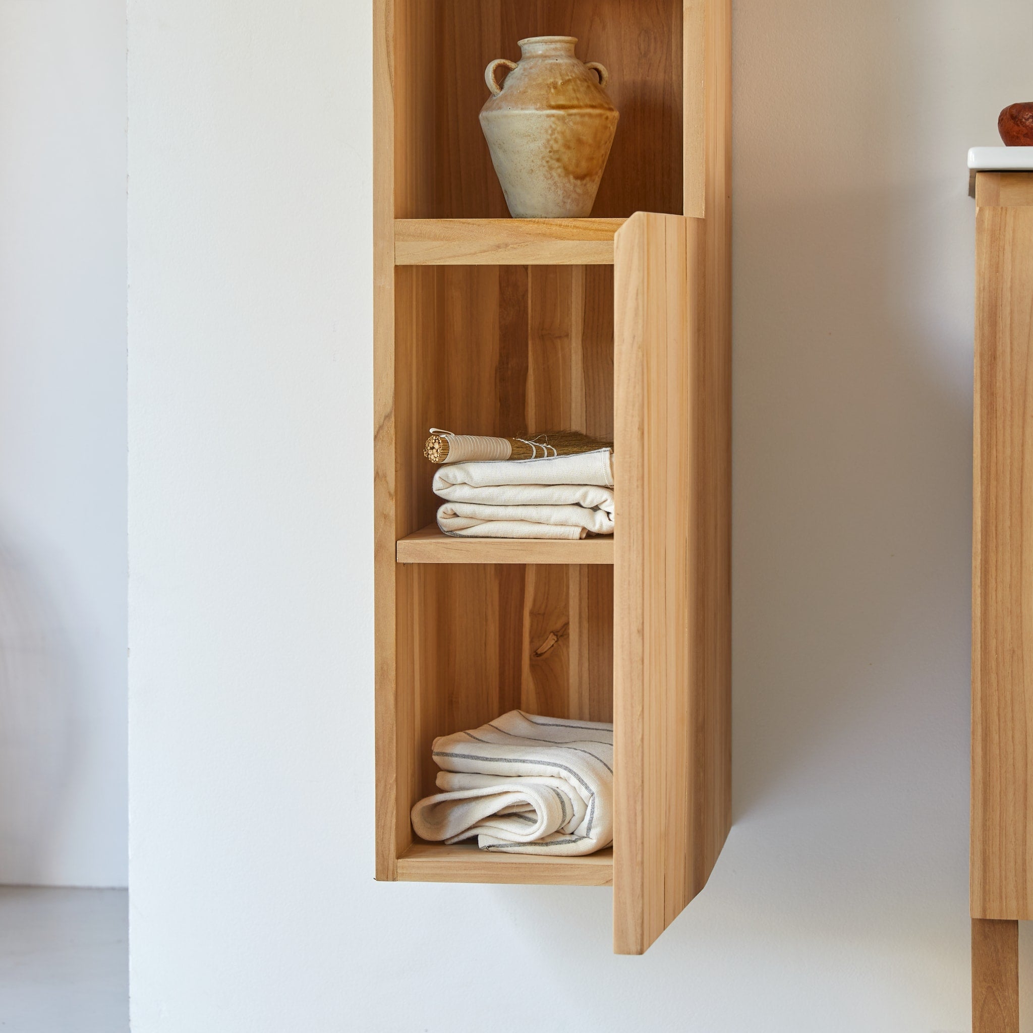 Tikamoon Jill wall-mounted bathroom cabinet in solid teak, side view