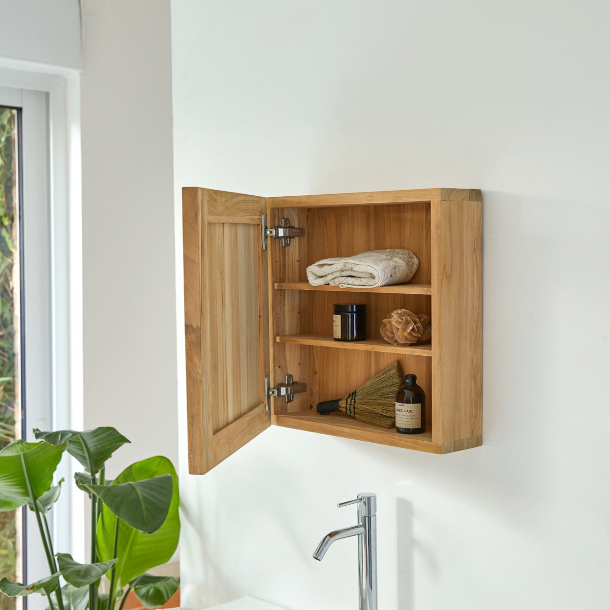 Jill teak bathroom cabinet open, showing two shelves