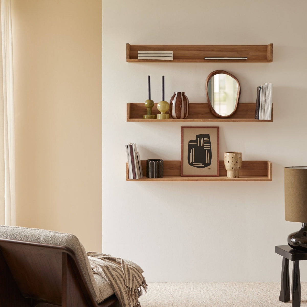 Tikamoon Arty teak shelves used as wall shelving in a living room