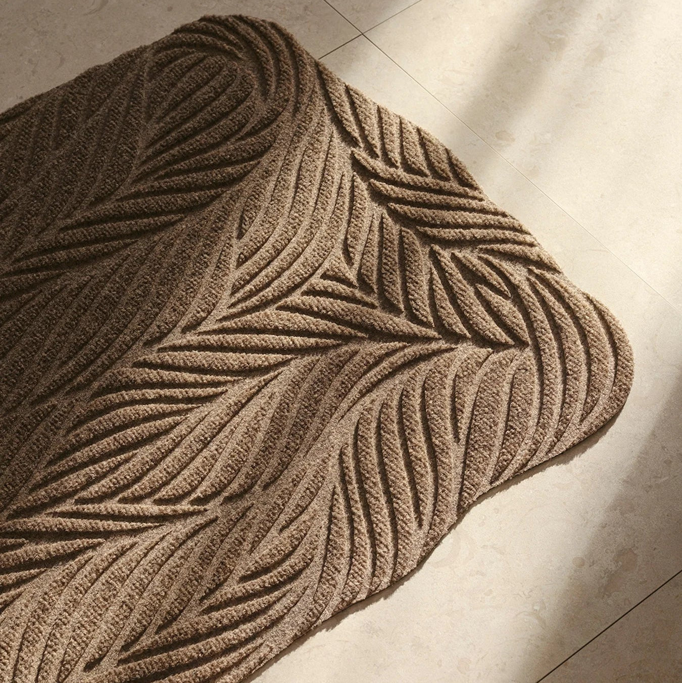 Heymat Twine All Weather Doormat doormat in Beige styled in an entryway, recycled PET yarn Norwegian design
