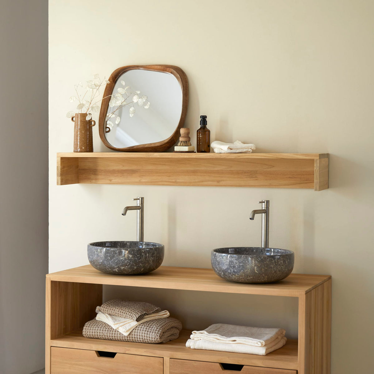 Tikamoon Arty teak wall shelf mounted above a teak vanity unit