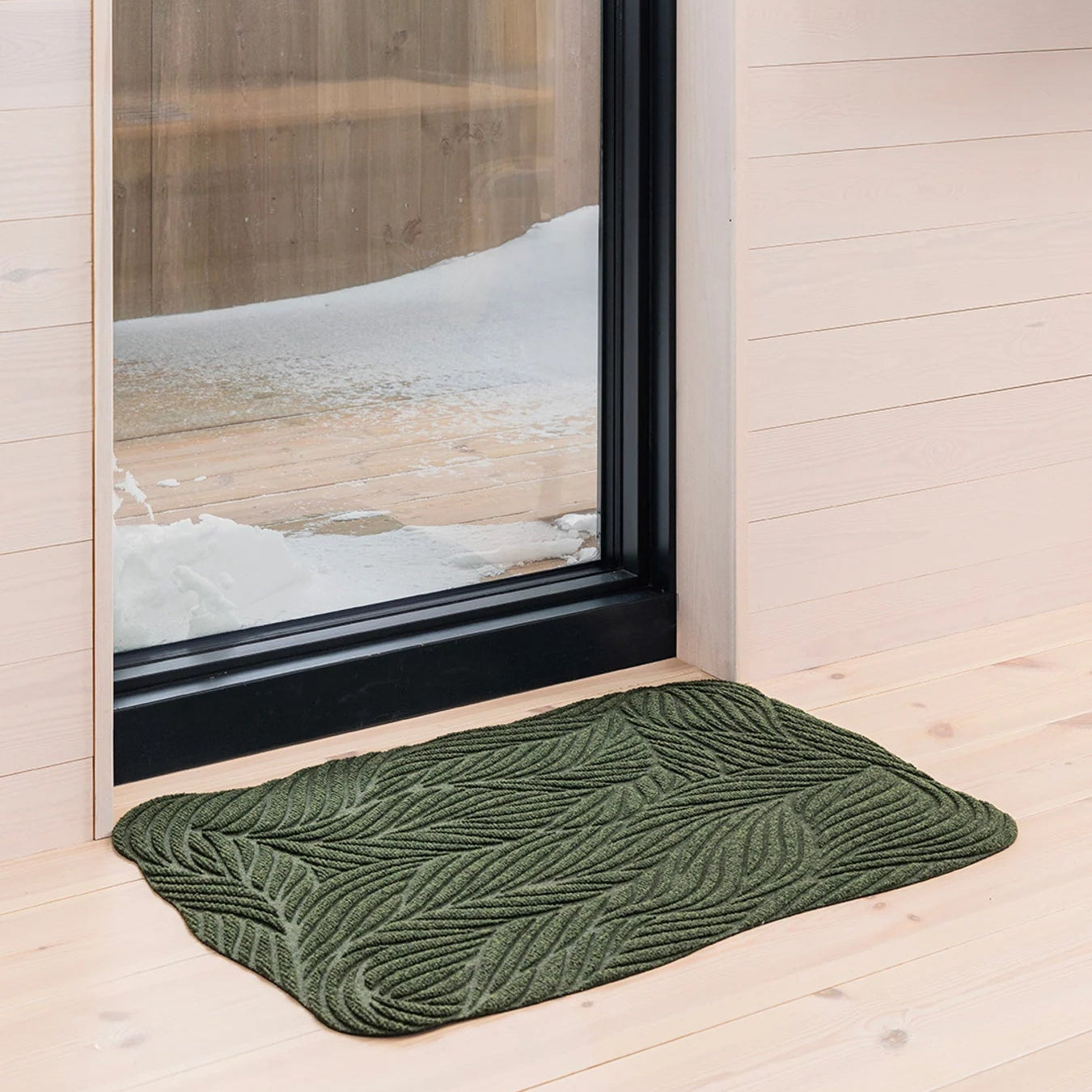 Heymat Twine All Weather Doormat doormat in Green styled in an entryway, recycled PET yarn Norwegian design
