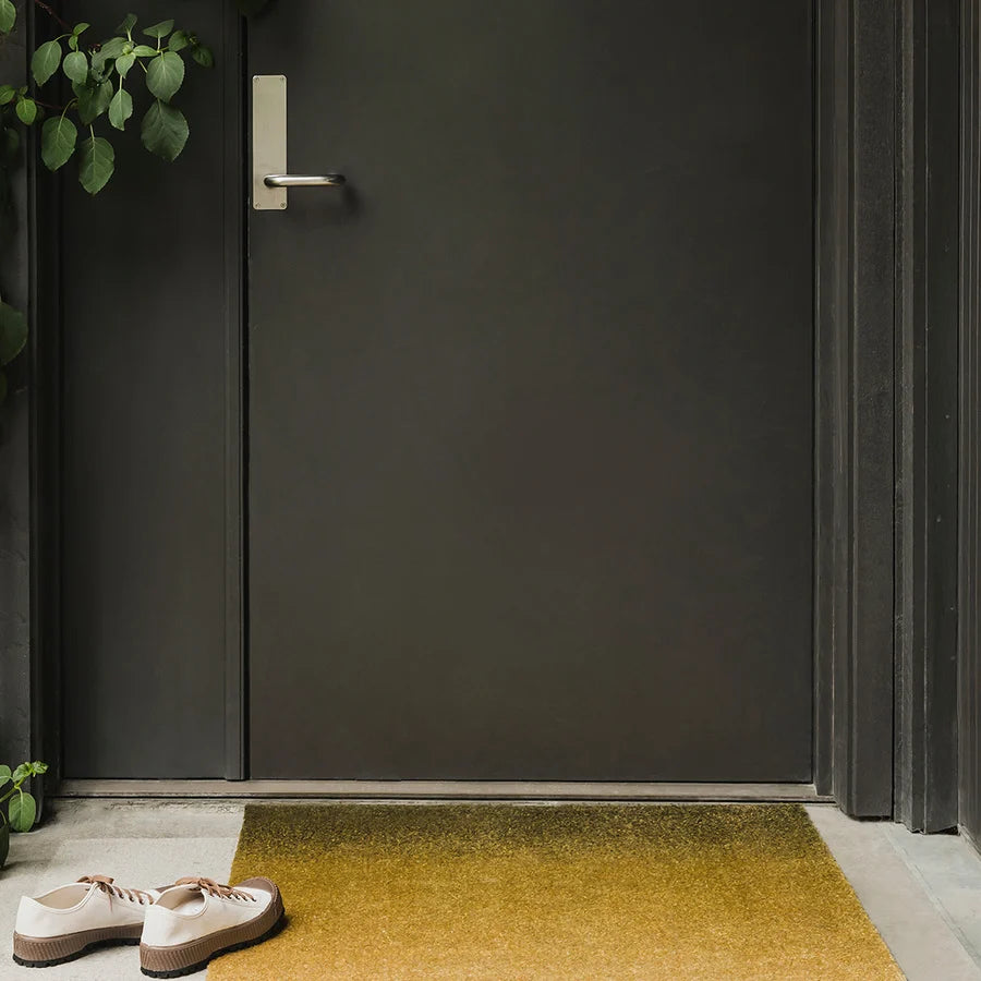Heymat Dis Doormat in Moss, recycled PET yarn doormat, Norwegian sustainable design