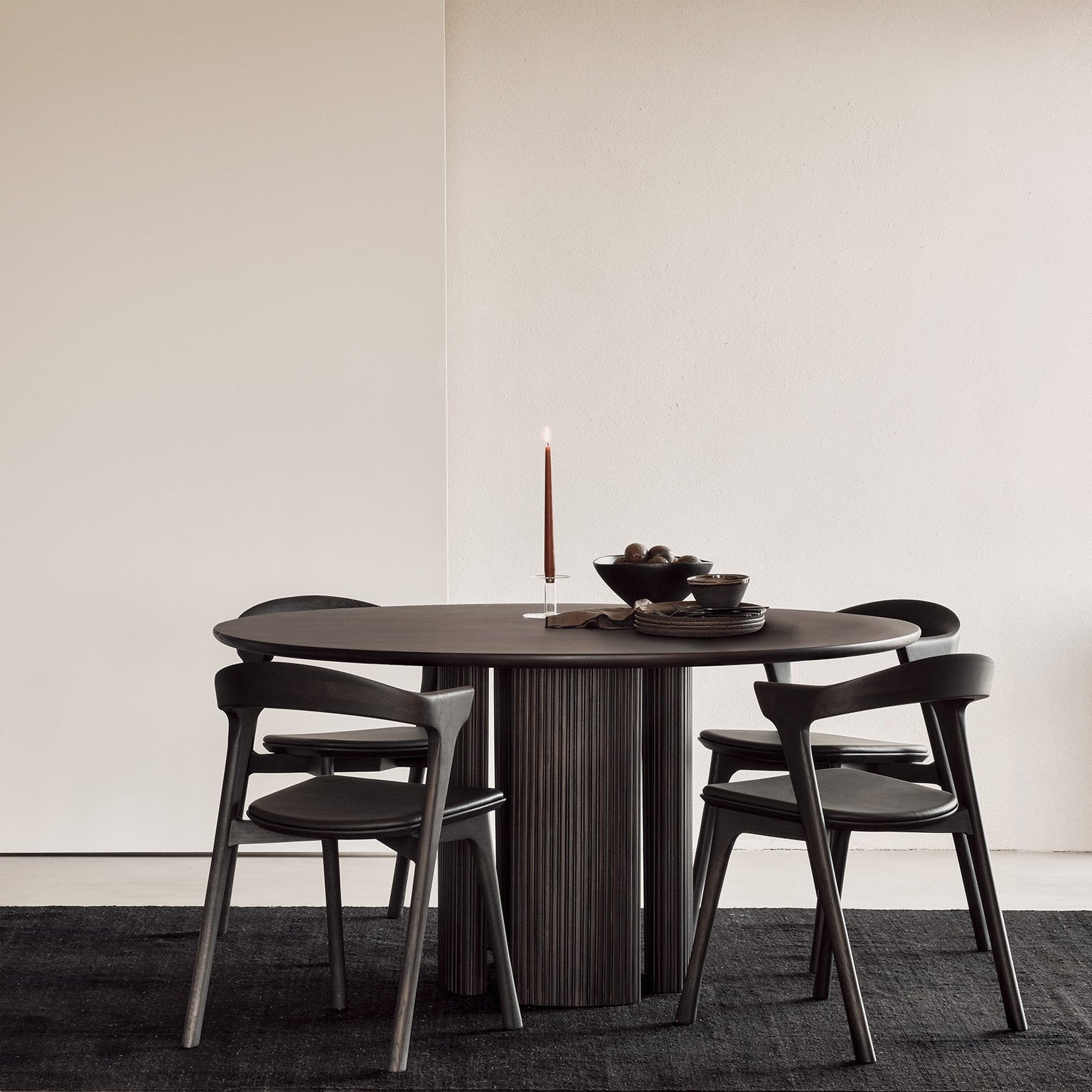 Ethnicraft Roller Max Dining Table styled in a dining room
