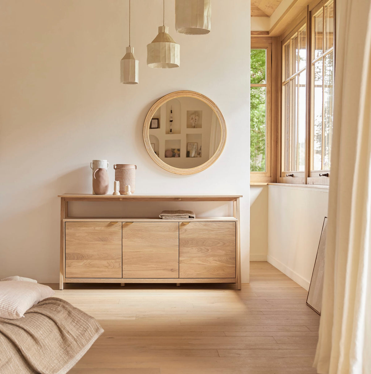 Tikamoon Pola sideboard in solid oak, angled view