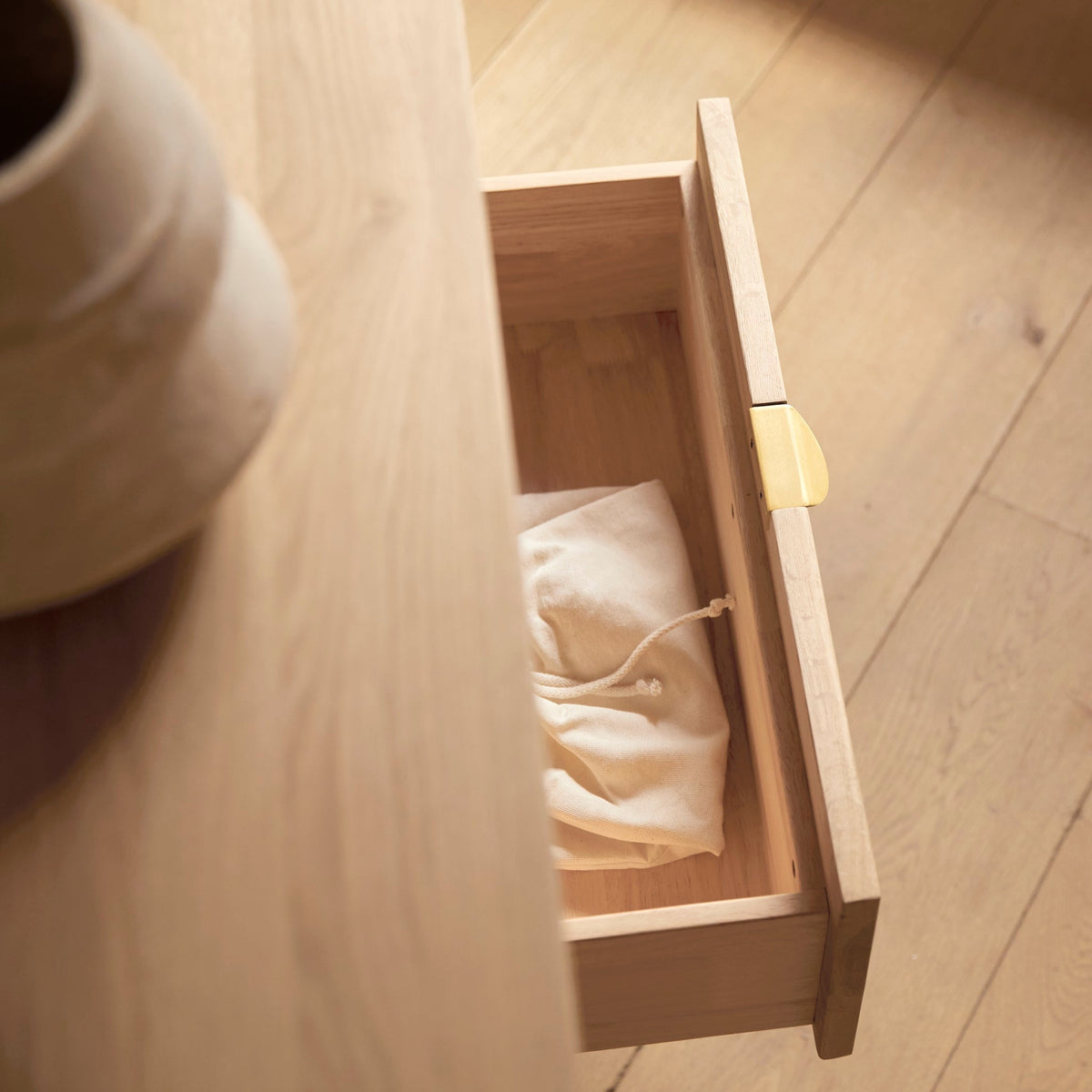 Tikamoon Pola oak console table, detail of the two drawers and open compartments