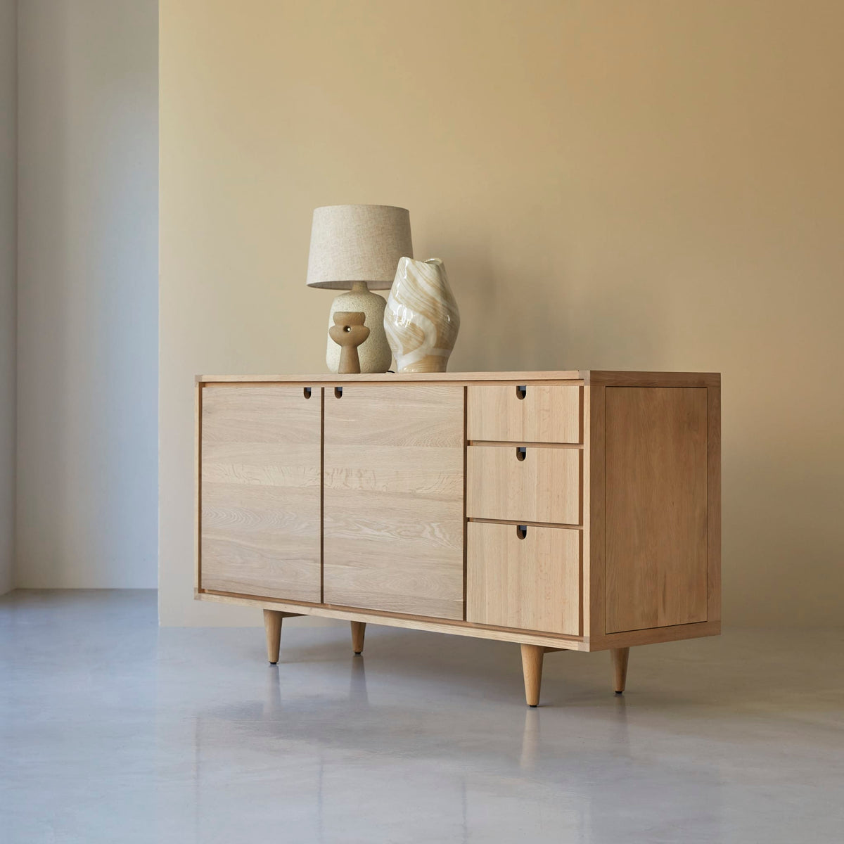 Tikamoon Jonàk sideboard in solid oak, three-quarter view from the right