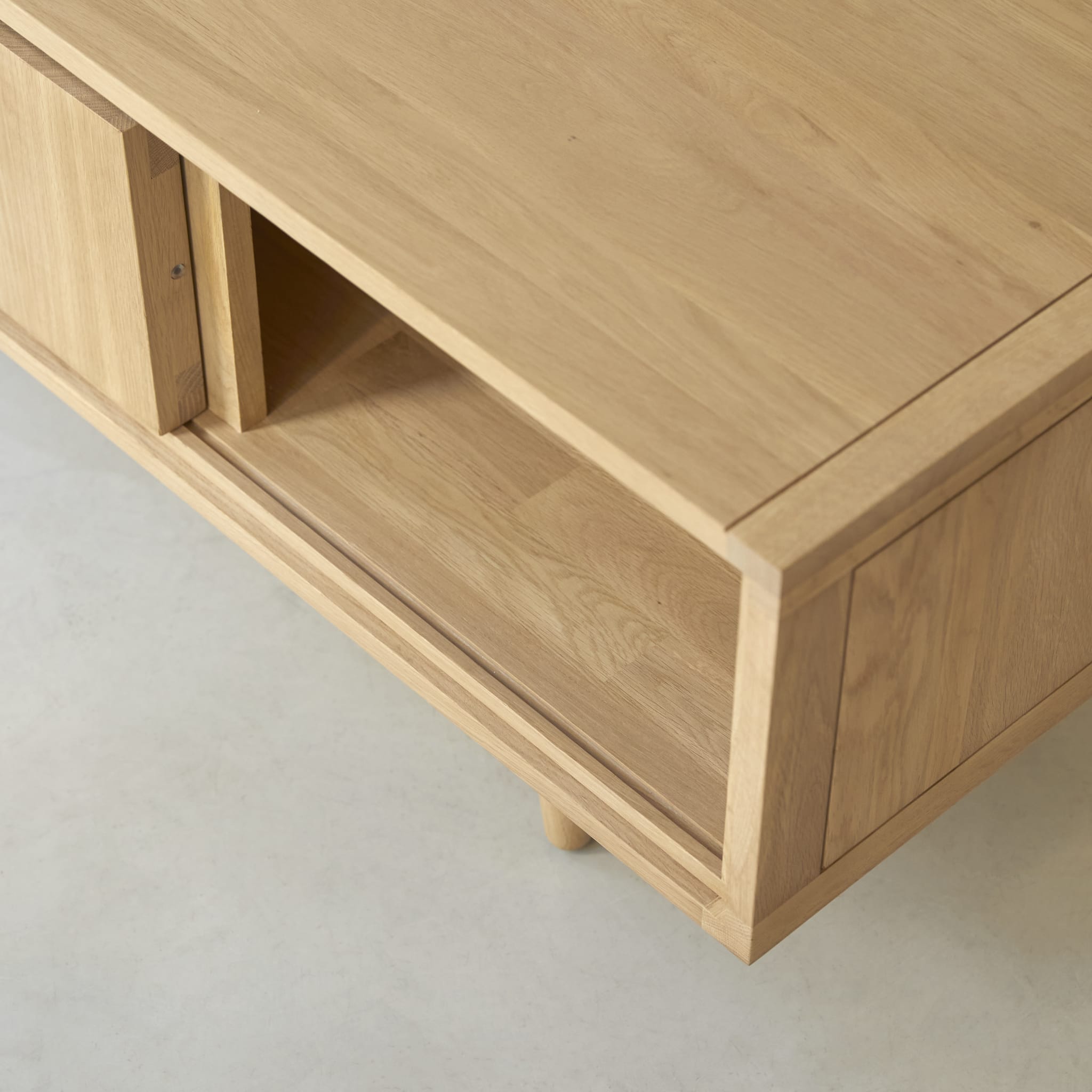 Tikamoon Jonàk TV stand in solid oak, side view