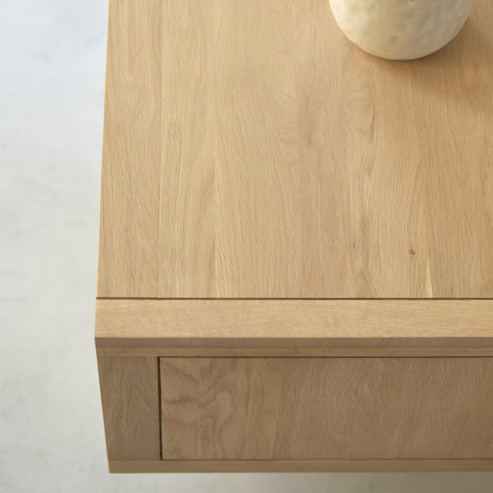 Tikamoon Jonàk TV stand in solid oak, three-quarter view