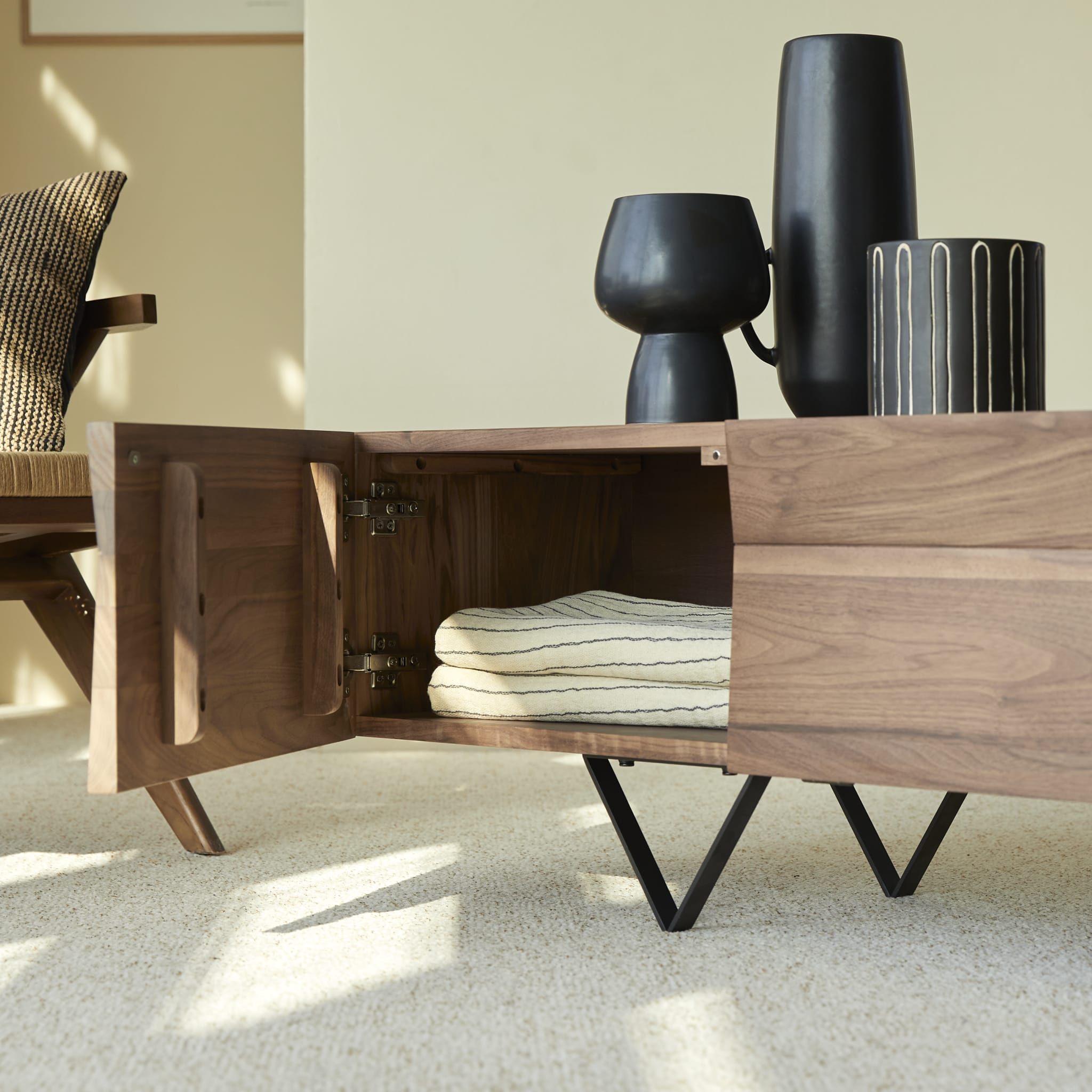 Tikamoon Metric TV stand in solid walnut, side view