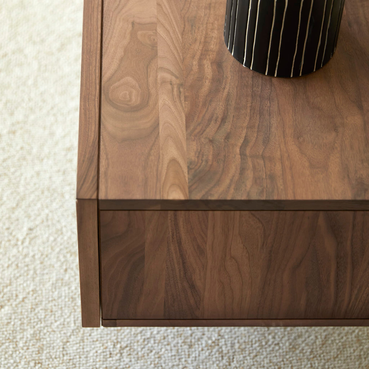 Tikamoon Metric TV stand in solid walnut, three-quarter view