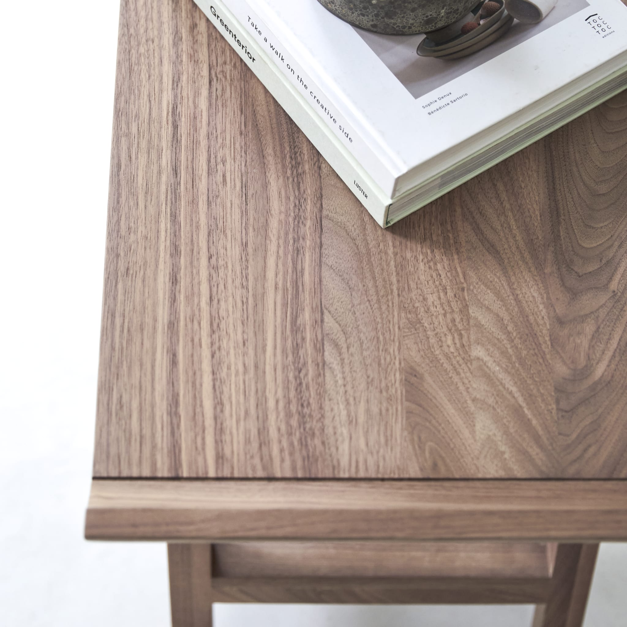 Tikamoon Pampa low console table in solid walnut, three-quarter view