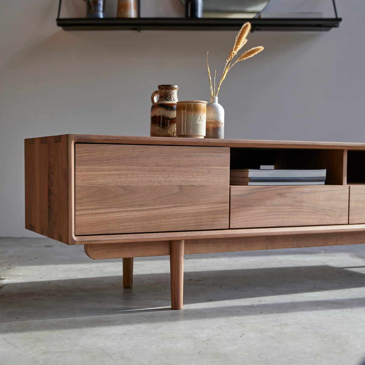 Tikamoon Ellie walnut TV stand, close-up of the grain on the top