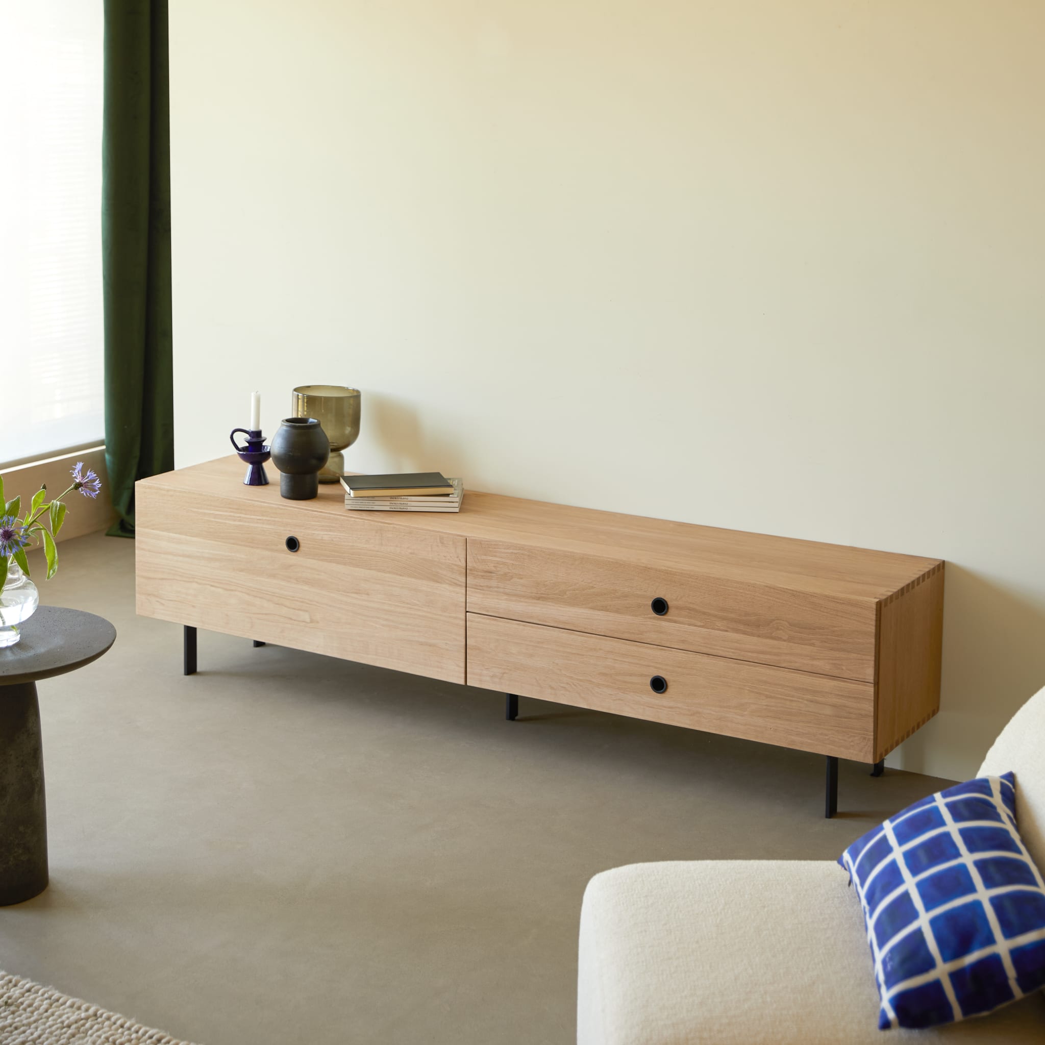 Tikamoon Jeanne TV stand in solid oak, angled view