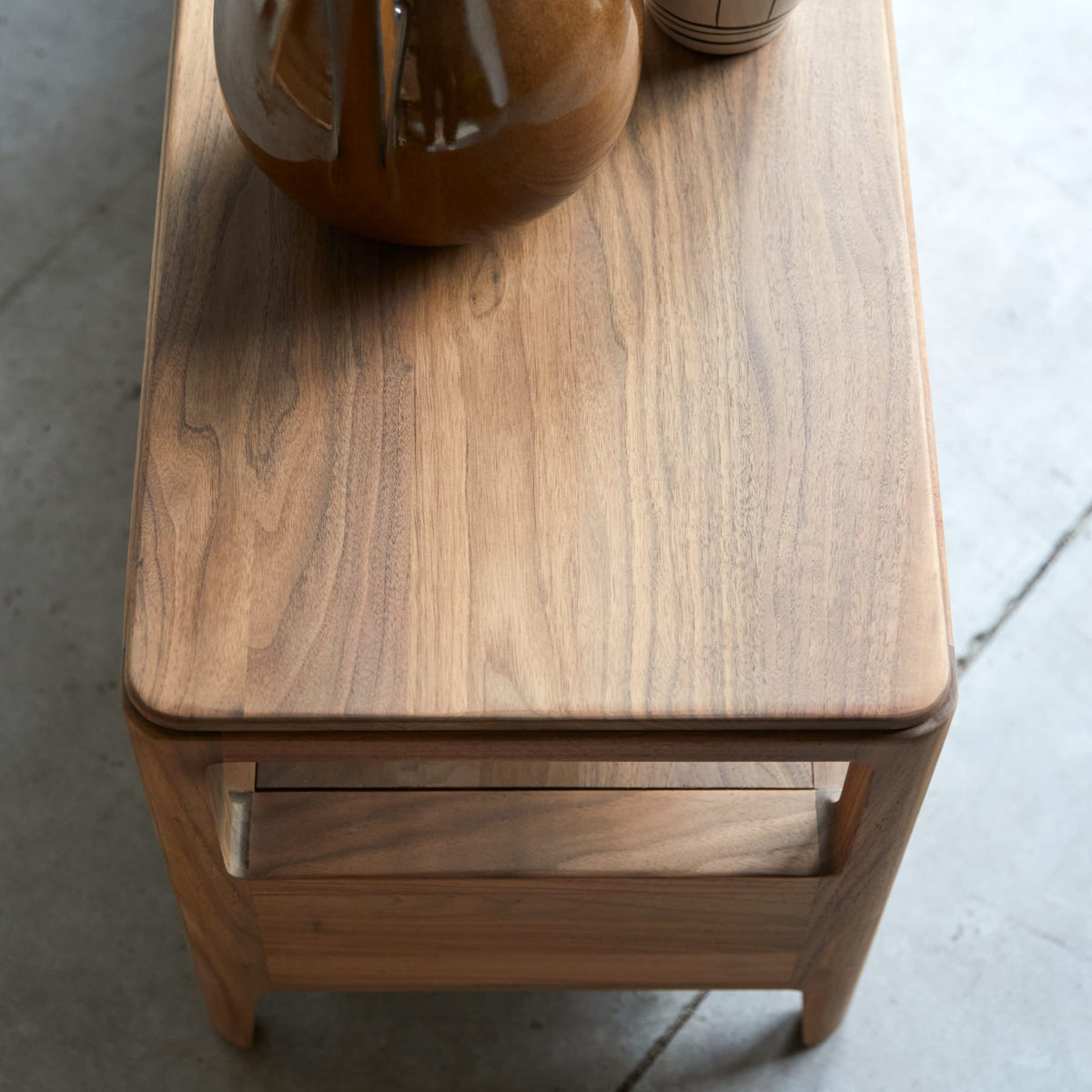Tikamoon Arto TV stand in solid walnut, side profile