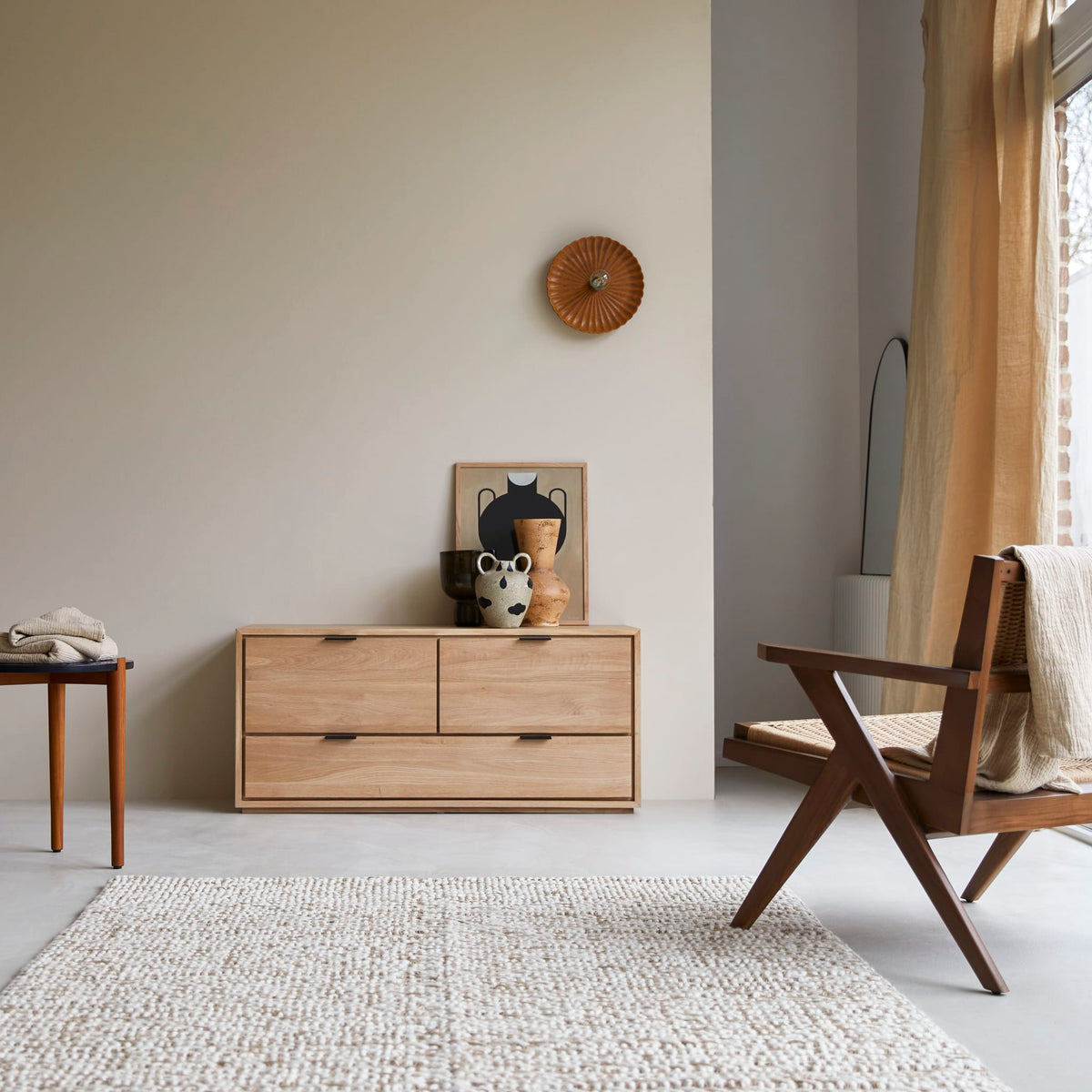 Tikamoon Senson solid oak TV stand in a bright living room