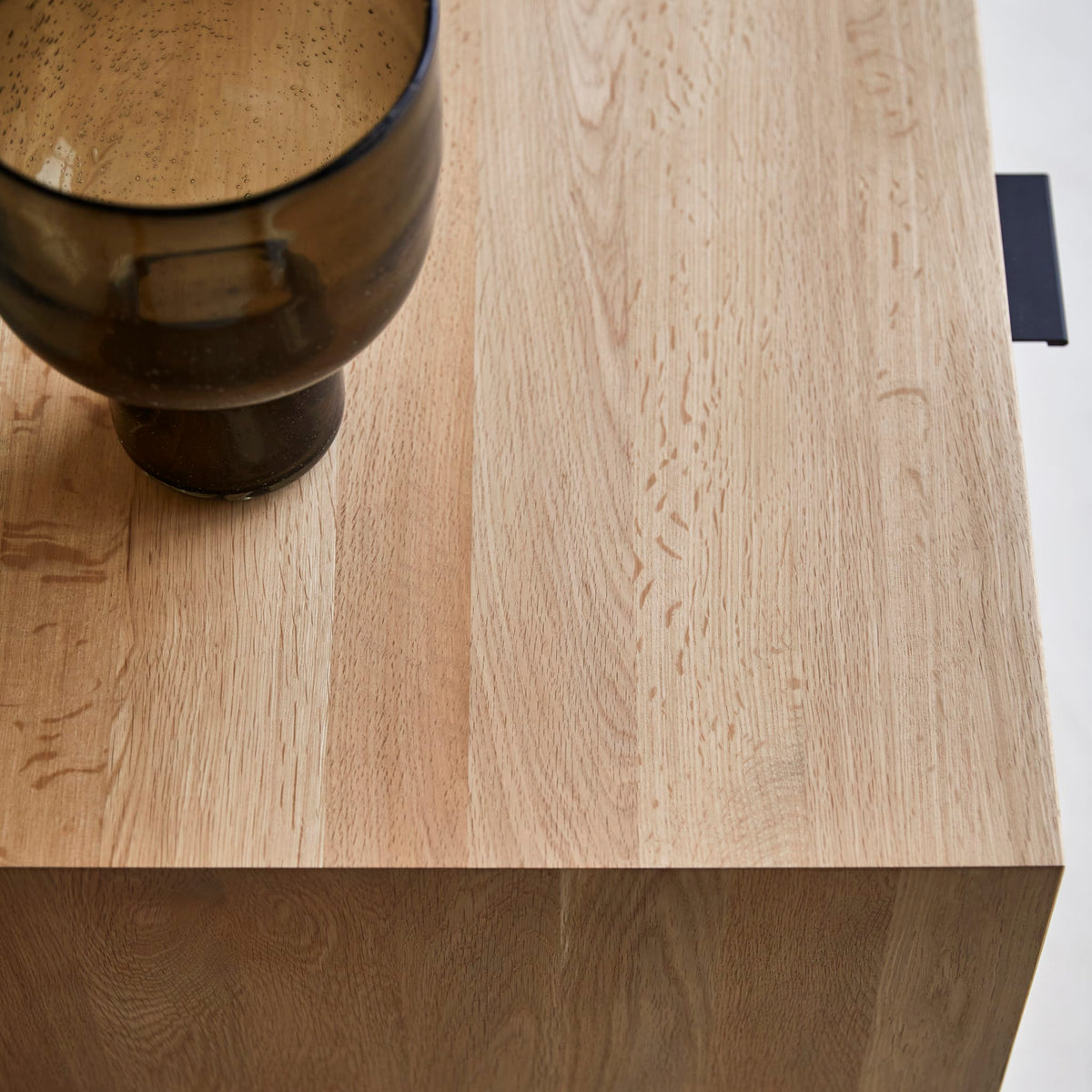 Close-up of the Senson TV stand oiled oak top and edge
