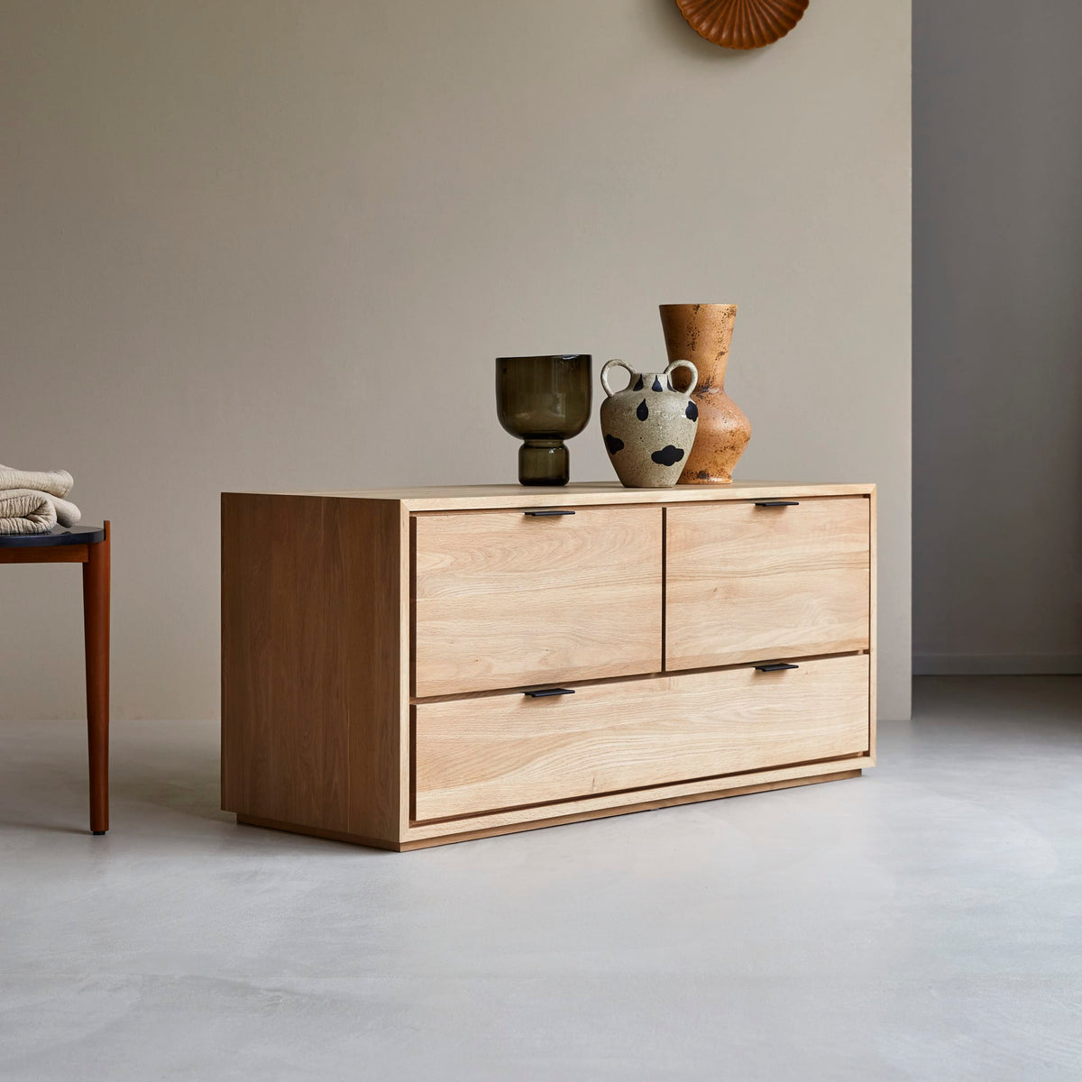 Tikamoon Senson oiled oak TV stand with ceramics on top