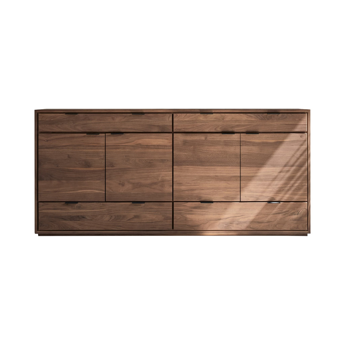 Tikamoon Senson sideboard in solid walnut, styled in a dining room