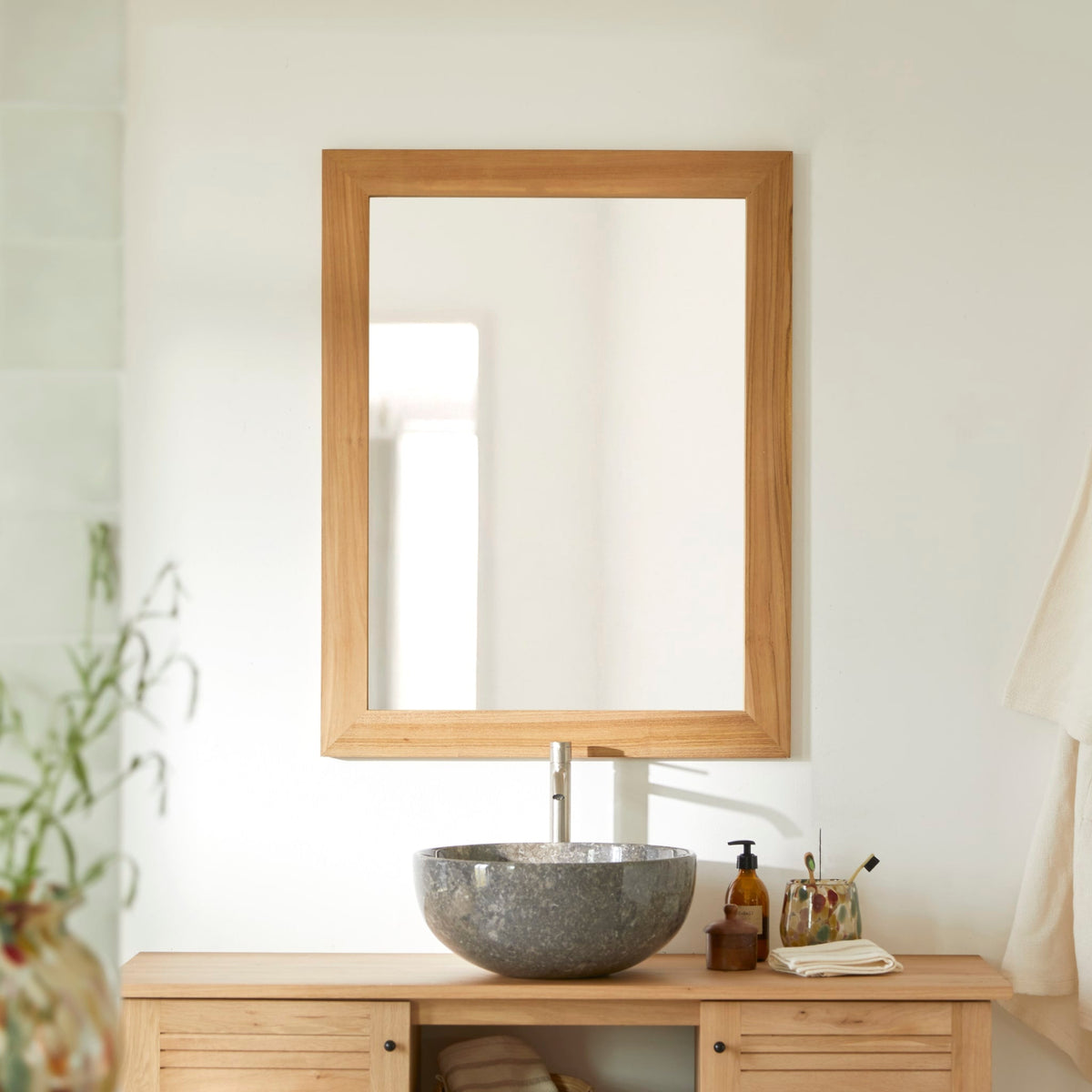 Tikamoon Tona solid teak mirror in a bright bathroom