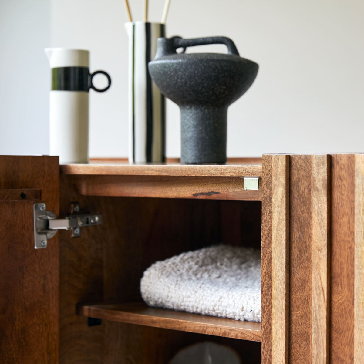 Tikamoon Milo sideboard in solid mango wood, rear view