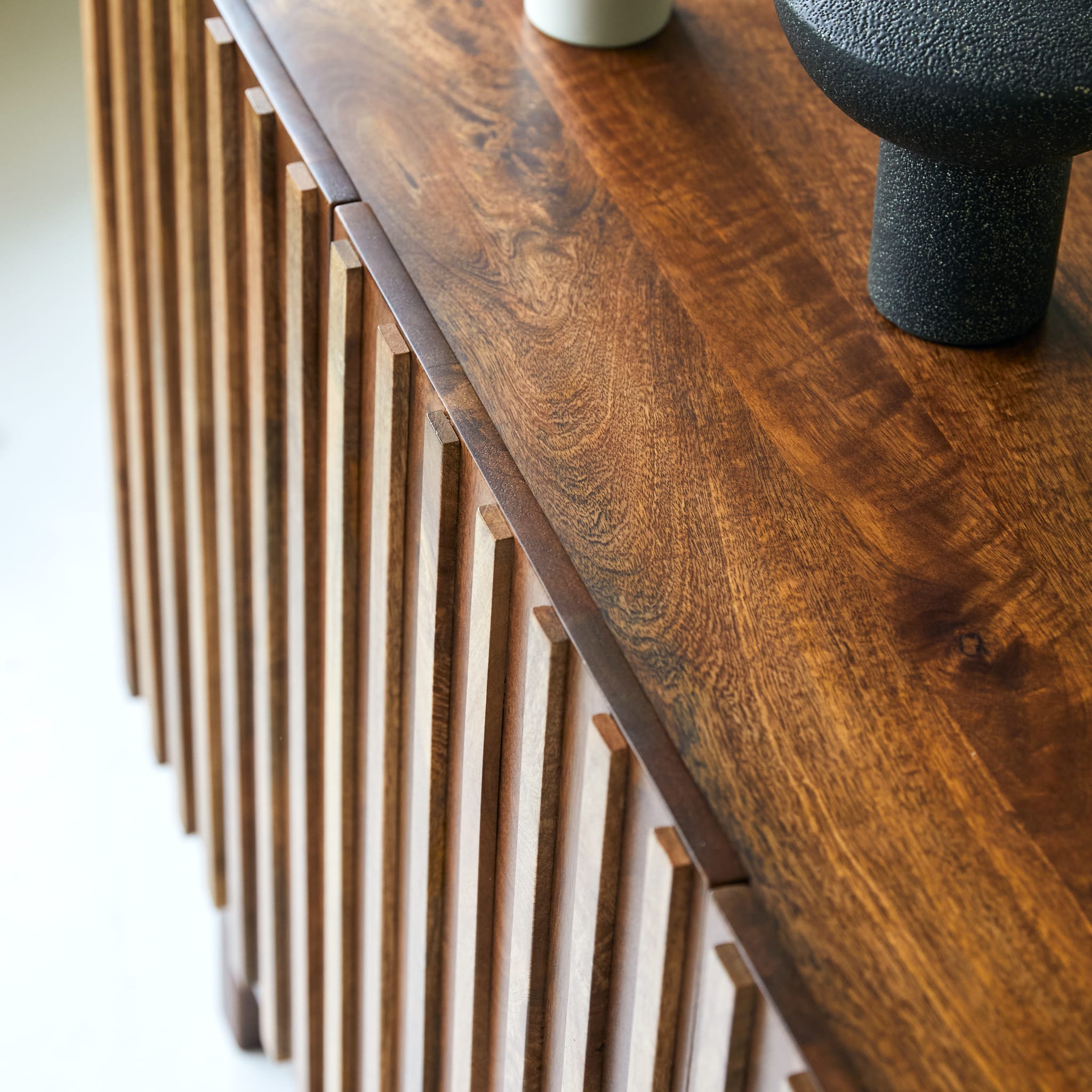 Tikamoon Milo sideboard in solid mango wood, side view