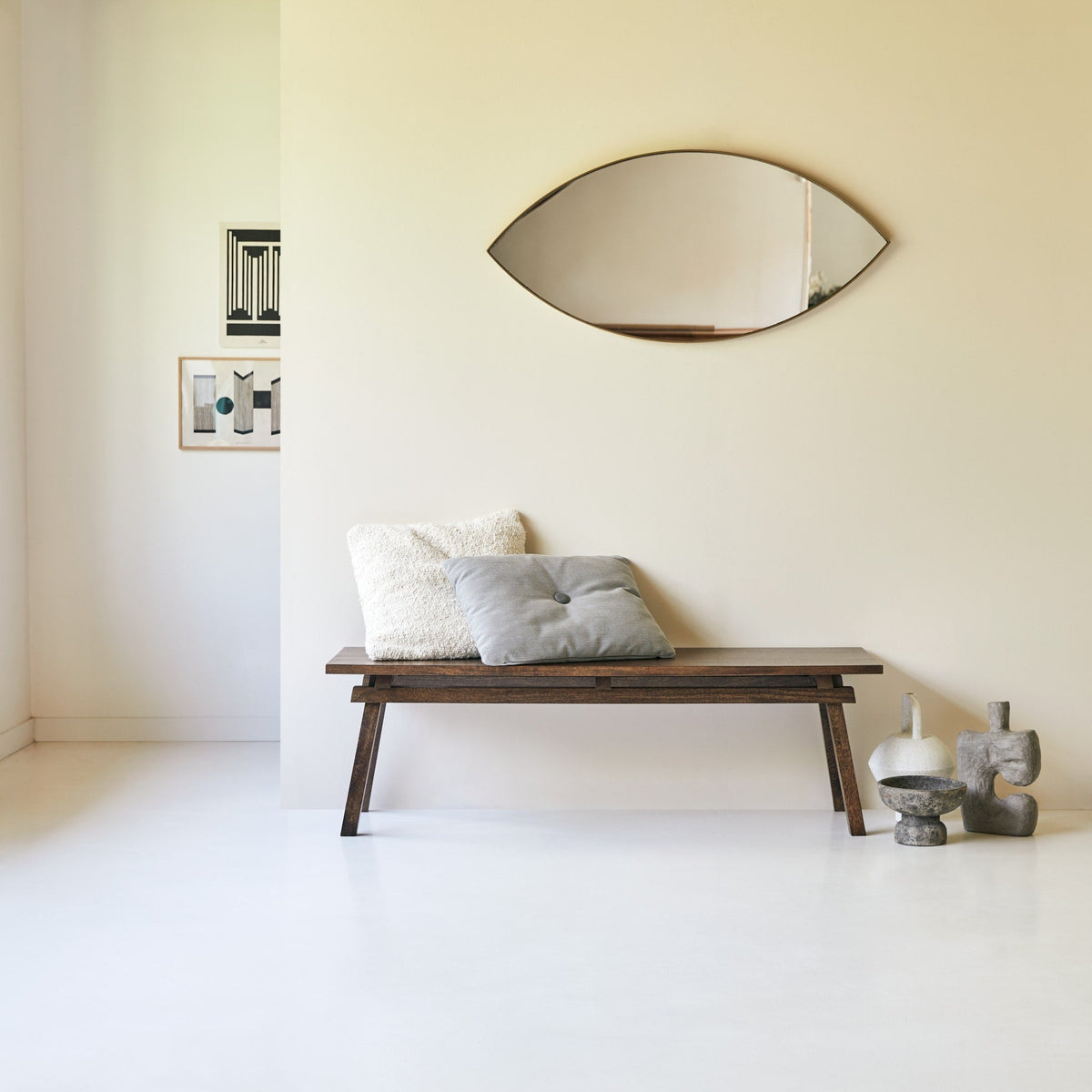 Tikamoon Arko bench in solid mango, angled view