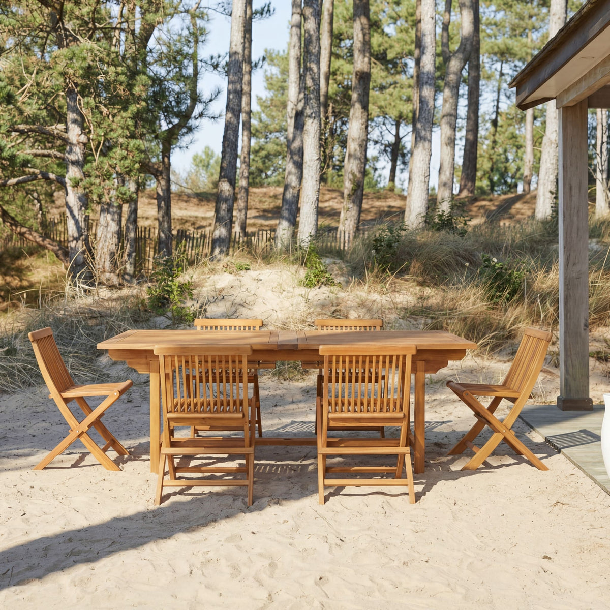 Tikamoon Capri rectangular acacia dining set, front view with the chairs tucked in