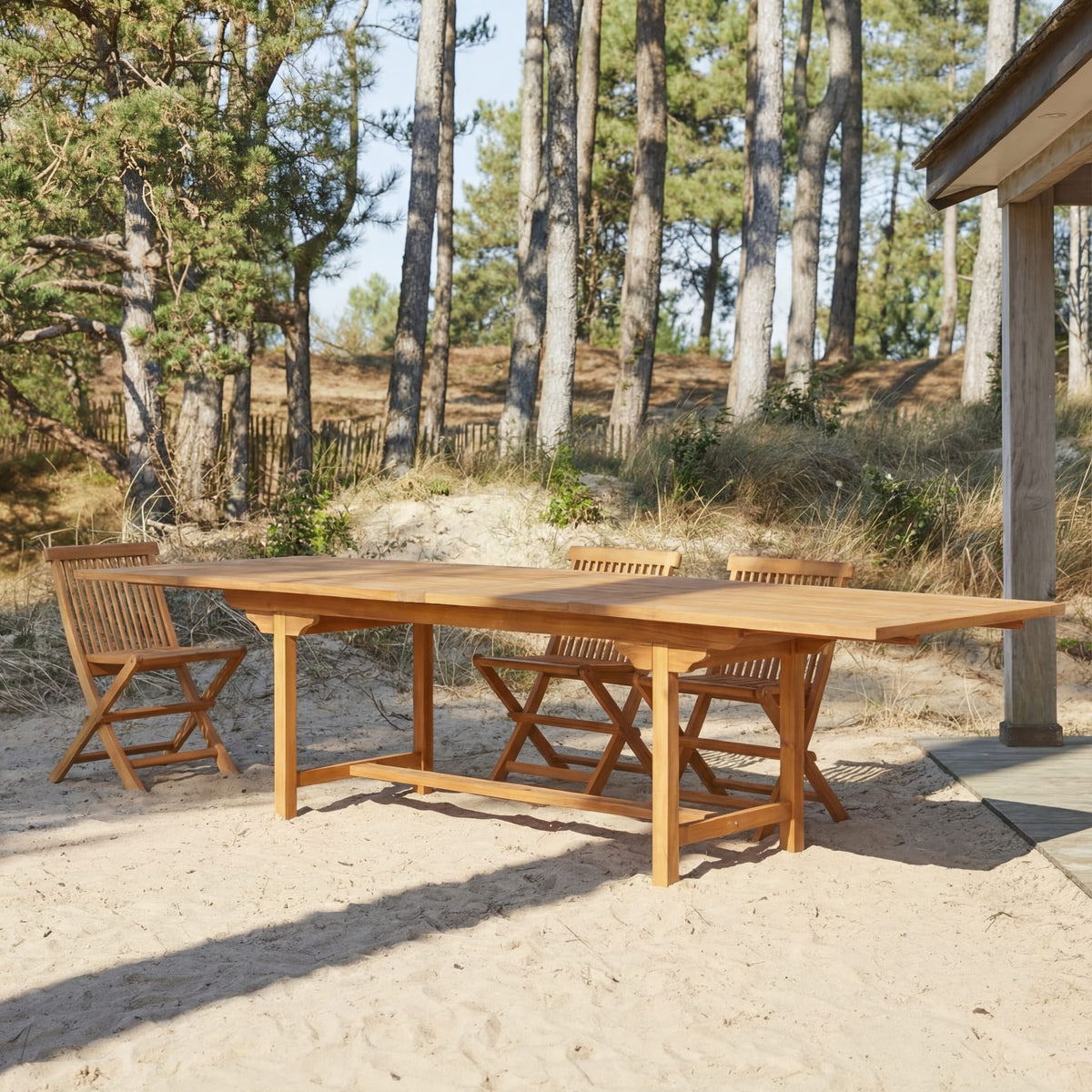 Tikamoon Capri rectangular garden dining set in solid acacia, front view of the table and chairs