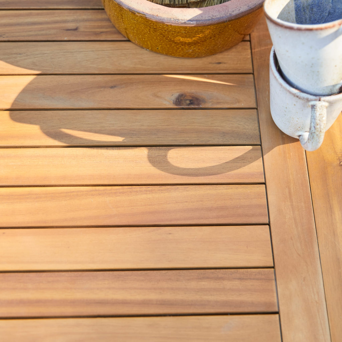 Tikamoon Capri oval acacia dining table, top view of the oval surface