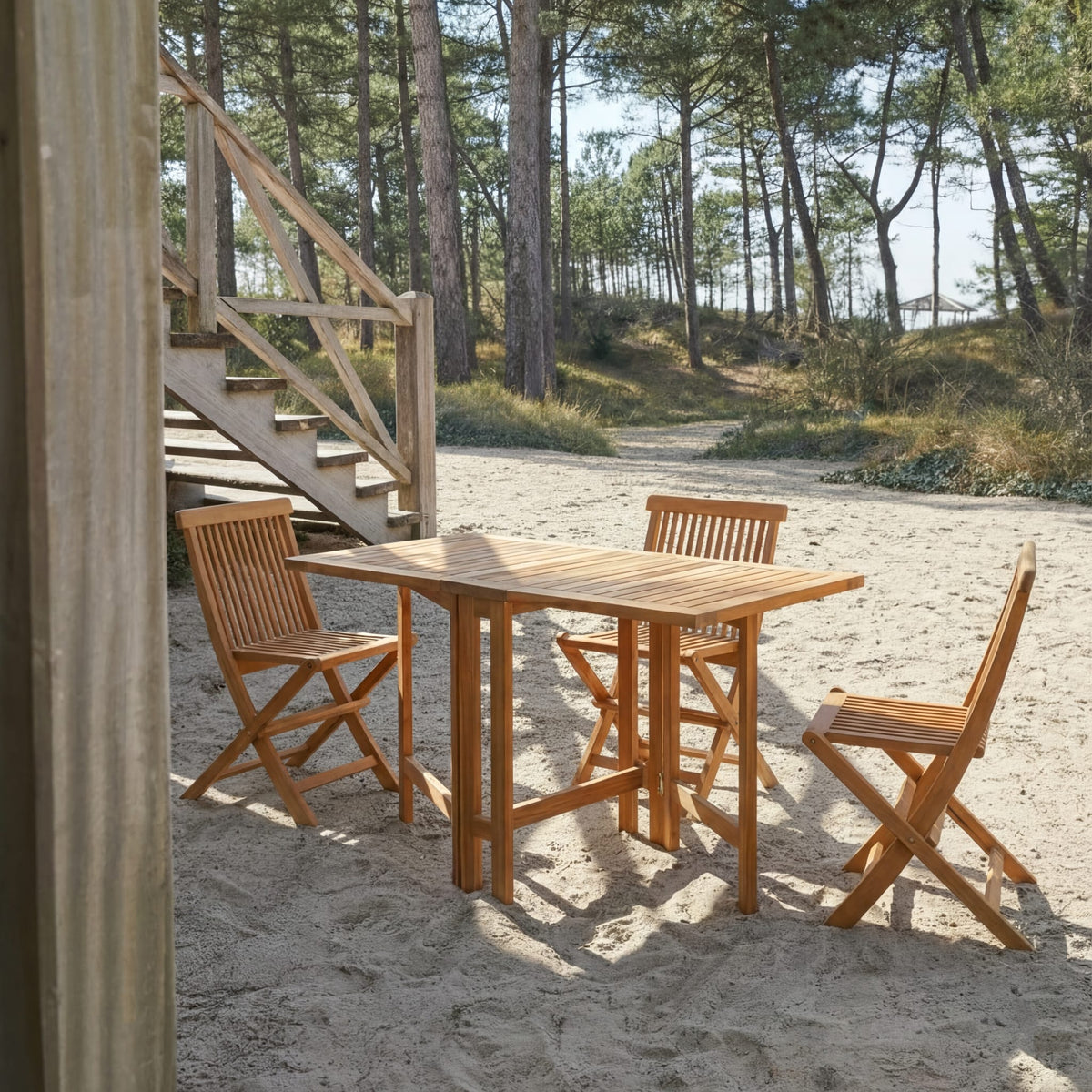 Tikamoon Capri folding garden dining set in solid acacia, side view of the set