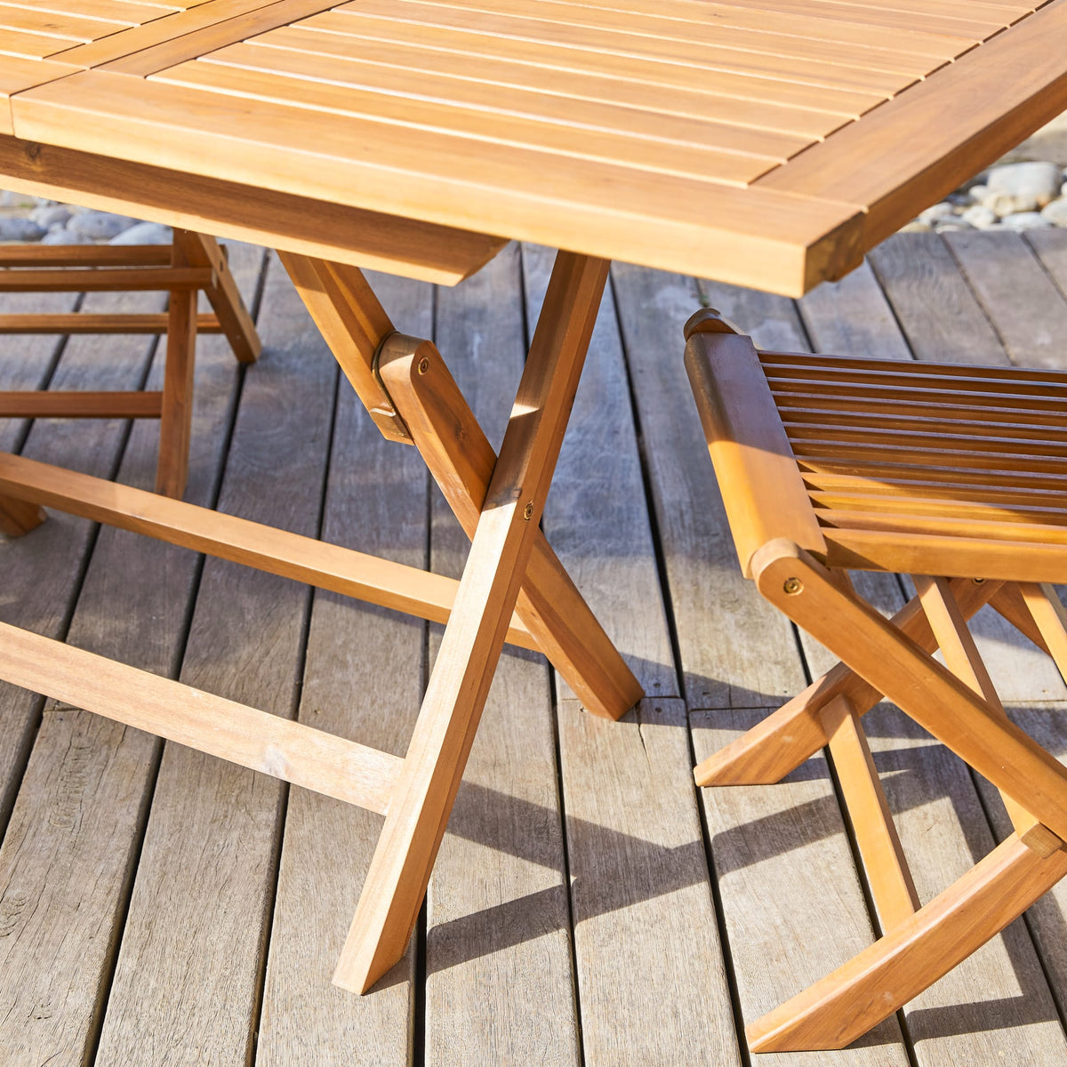 Tikamoon Capri folding acacia table, detail of the leg and frame