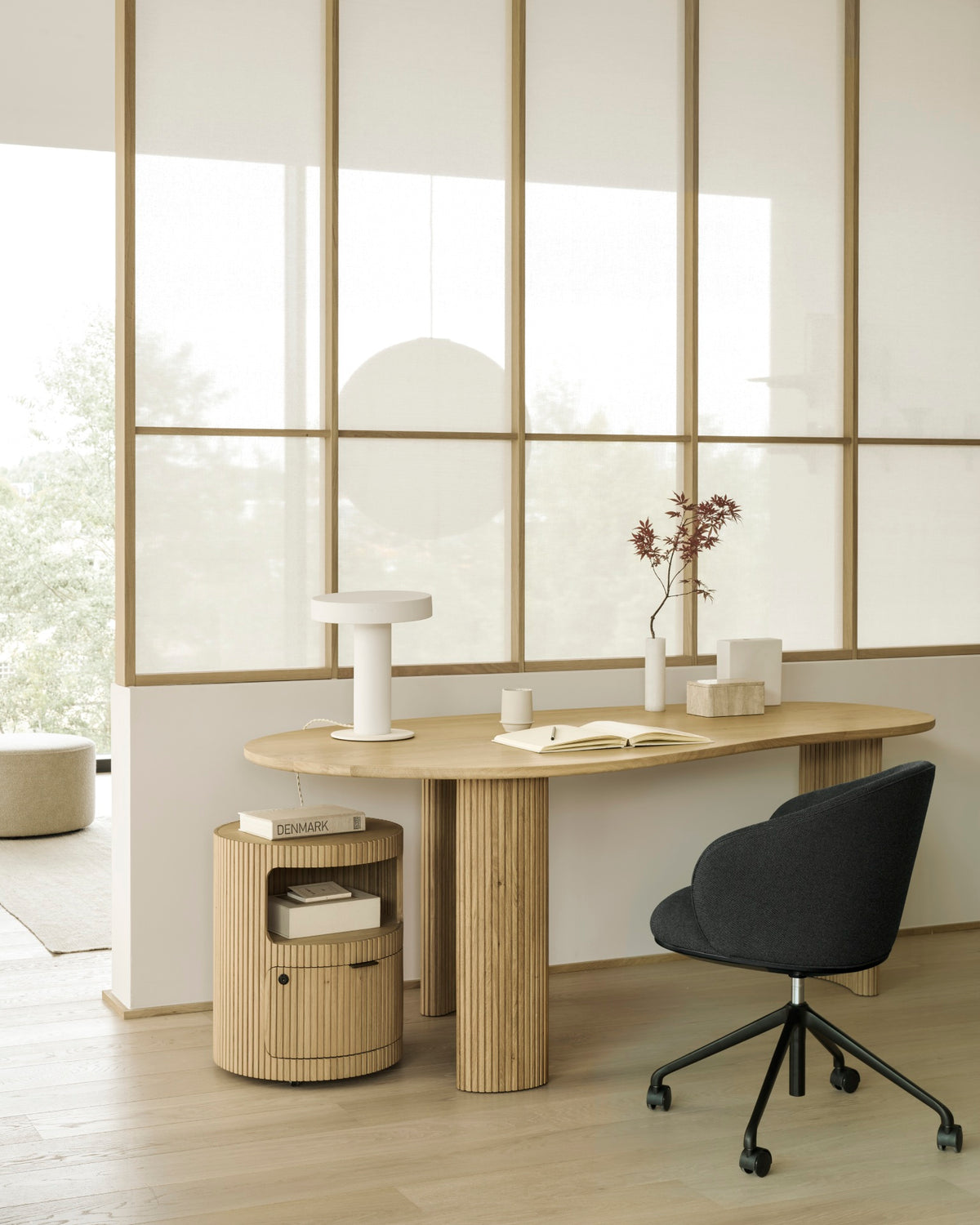 Ethnicraft Unda Office Chair in Charcoal at the Boomerang desk, styled in a home office, flat-weave upholstery