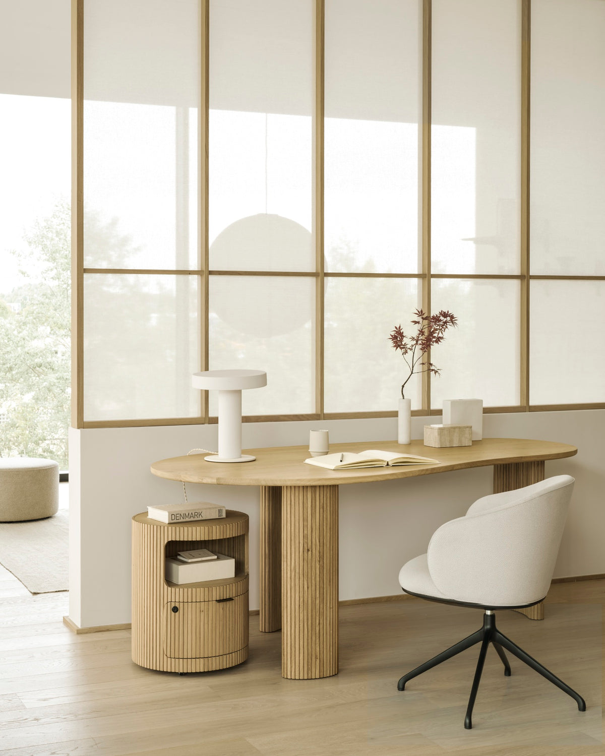 Ethnicraft Unda Office Chair in Salt at the Boomerang desk, styled in a home office, flat-weave upholstery
