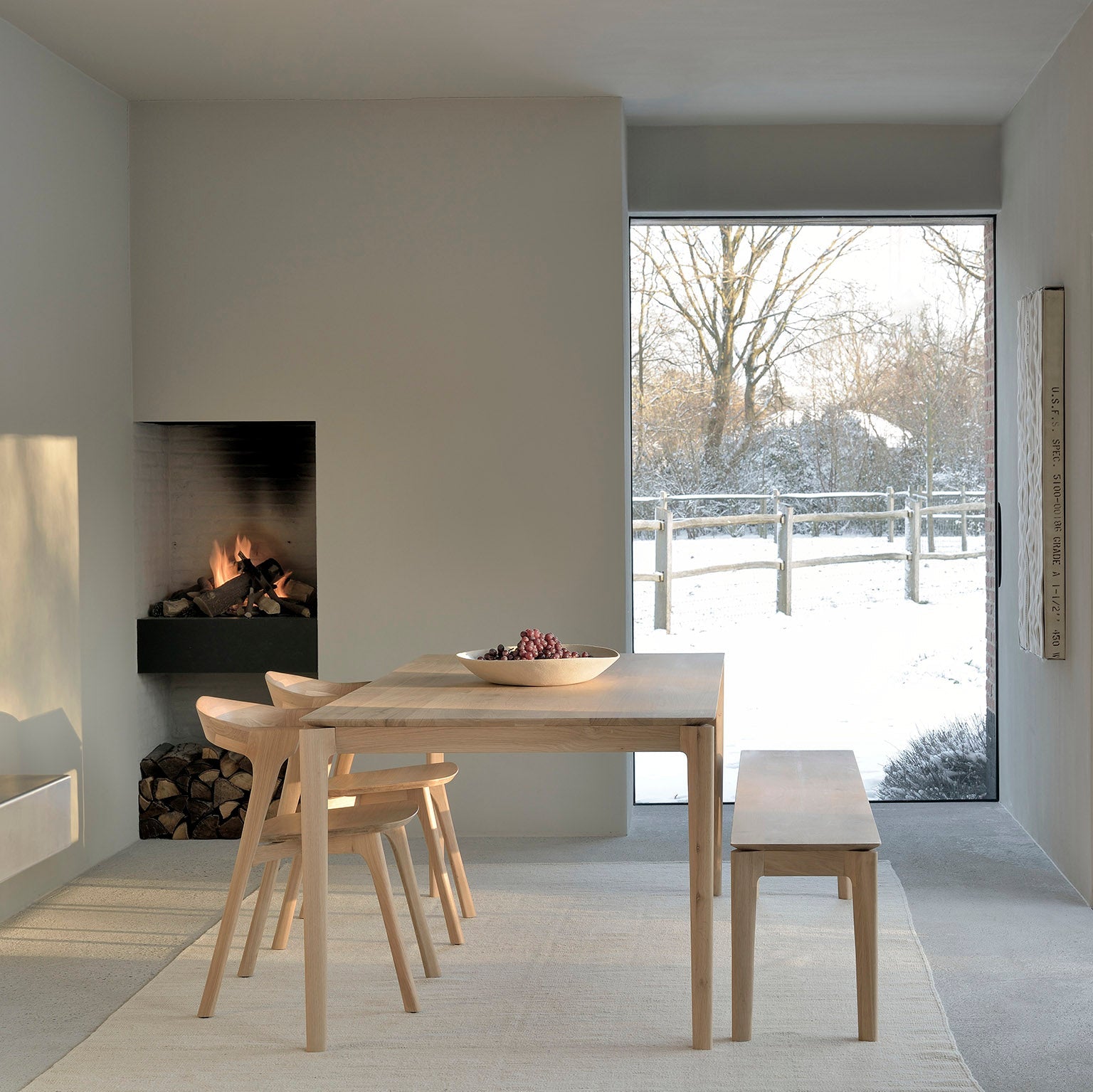 Ethnicraft Bok Bench in oak styled in a dining room