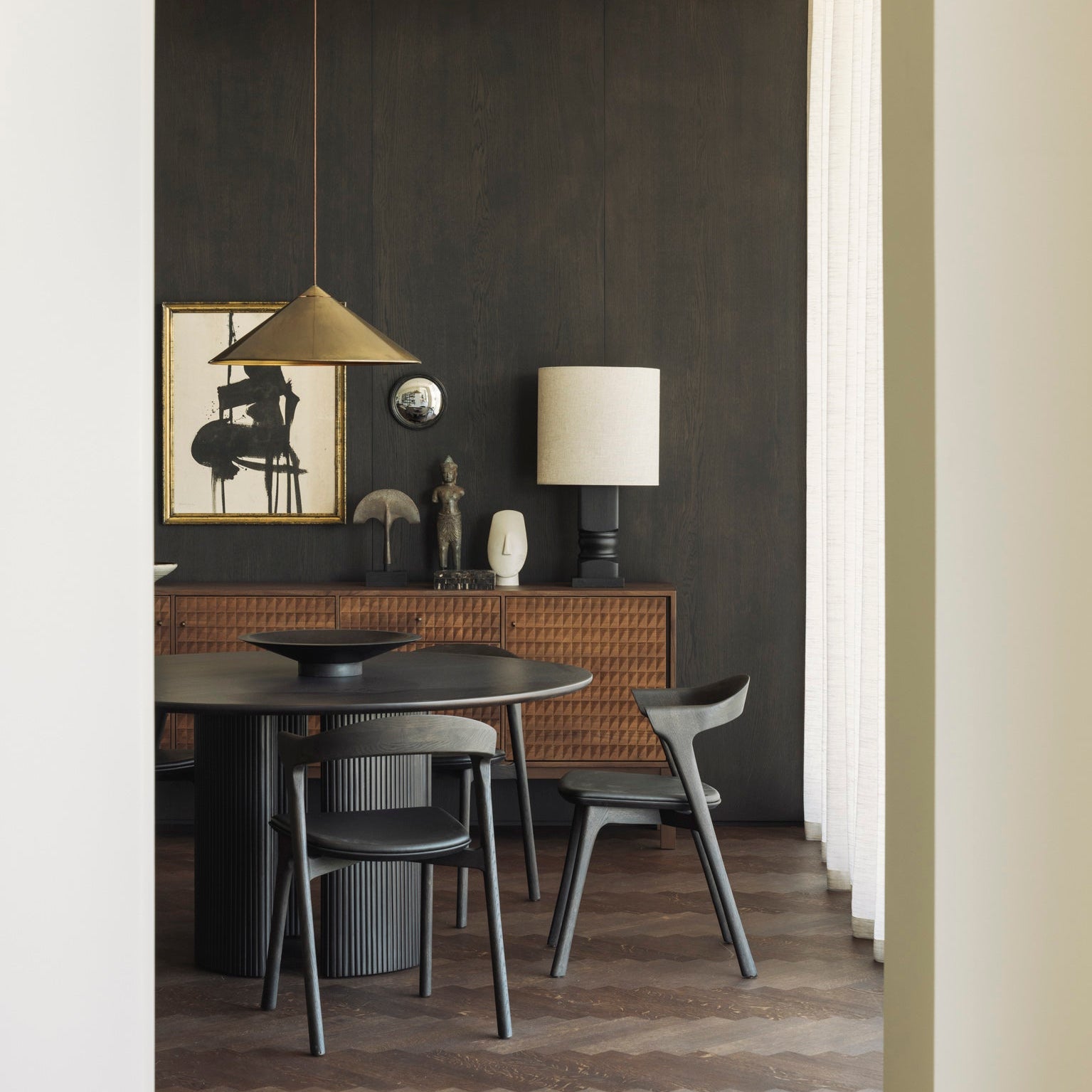 Ethnicraft Stairs Sideboard styled in a dining room