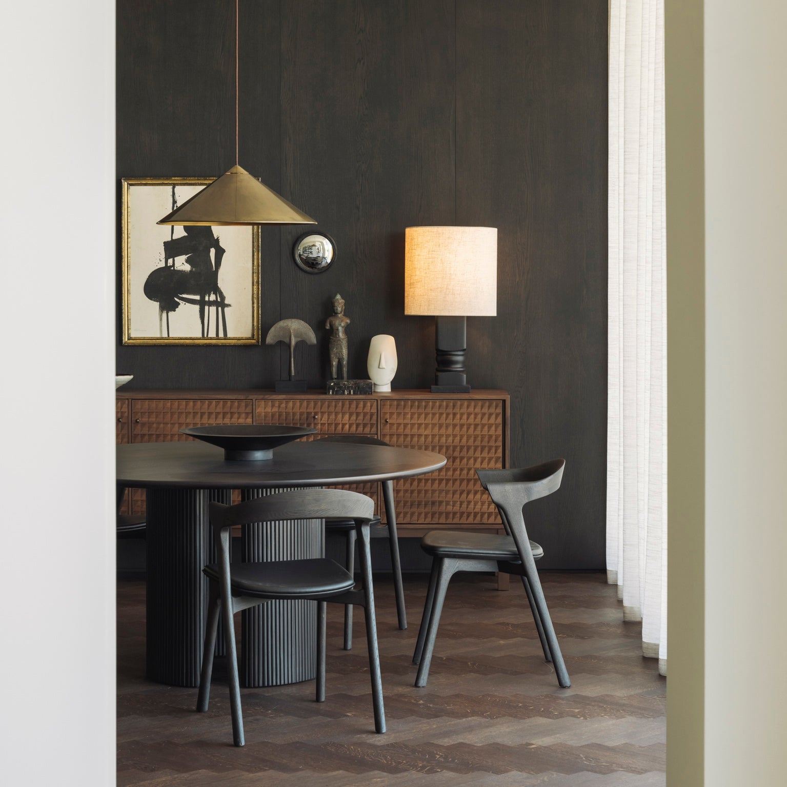 Ethnicraft Roller Max Dining Table styled in a dining room