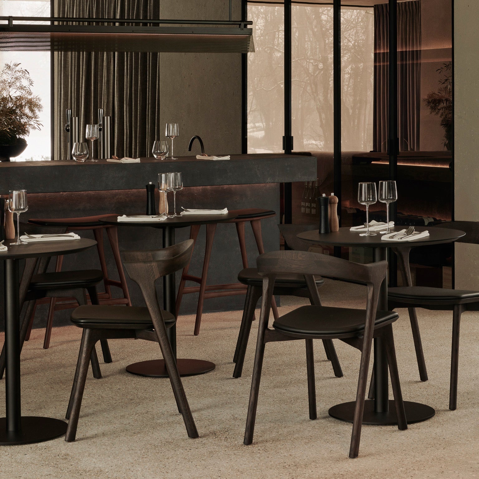 Ethnicraft Blend Dining Table in teak styled in a dining room