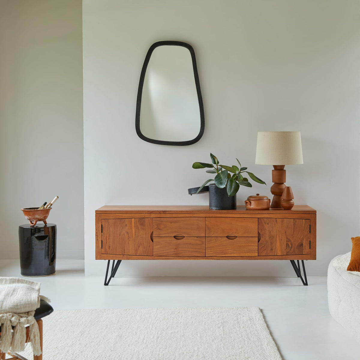 Tikamoon Bonnie TV stand in solid acacia, angled view