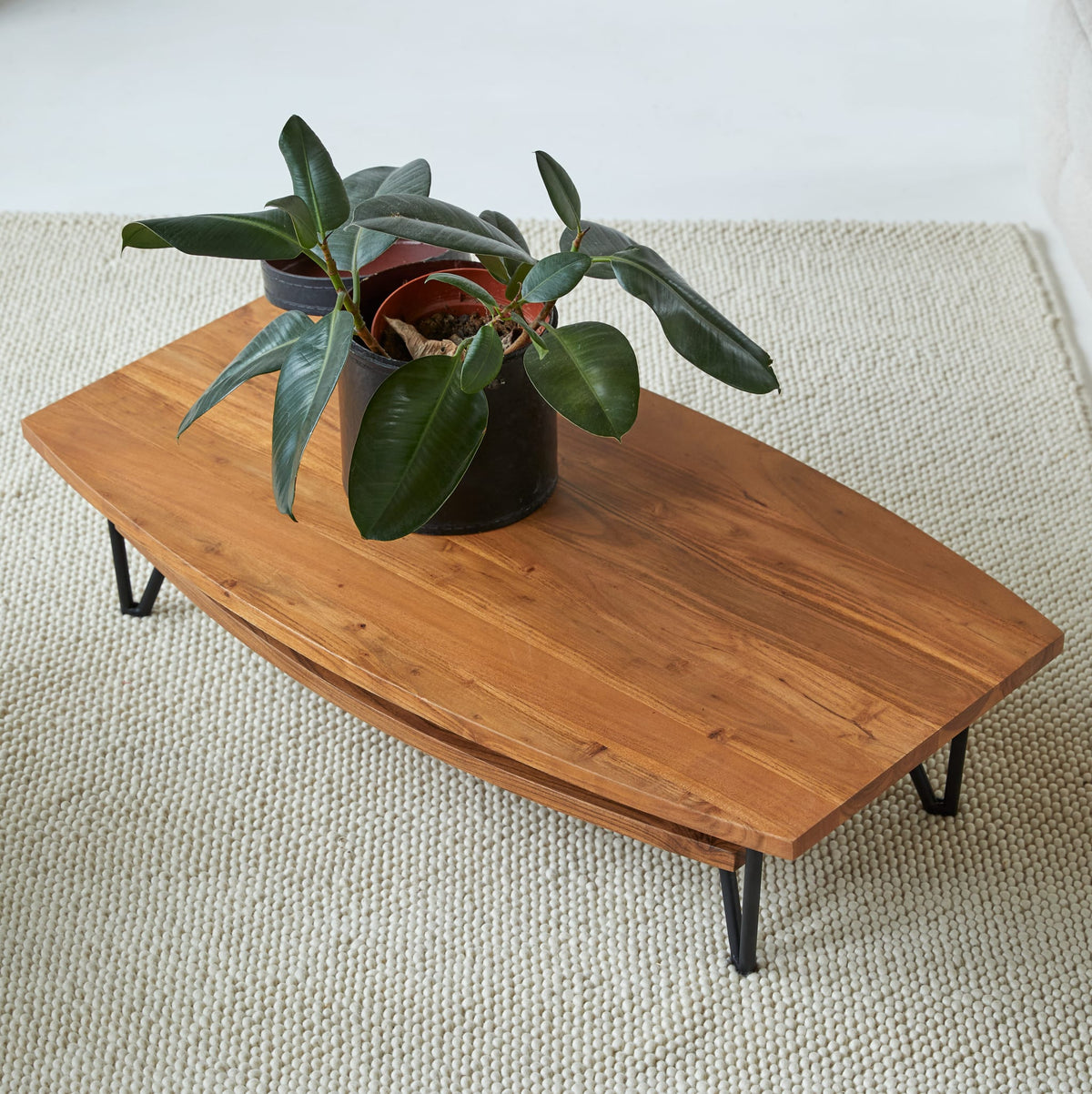 Tikamoon Bonnie coffee table in solid acacia with metal legs, three-quarter view