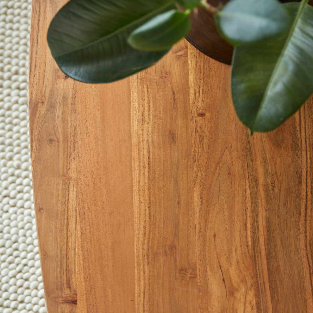 Tikamoon Bonnie coffee table in solid acacia with metal legs, side profile