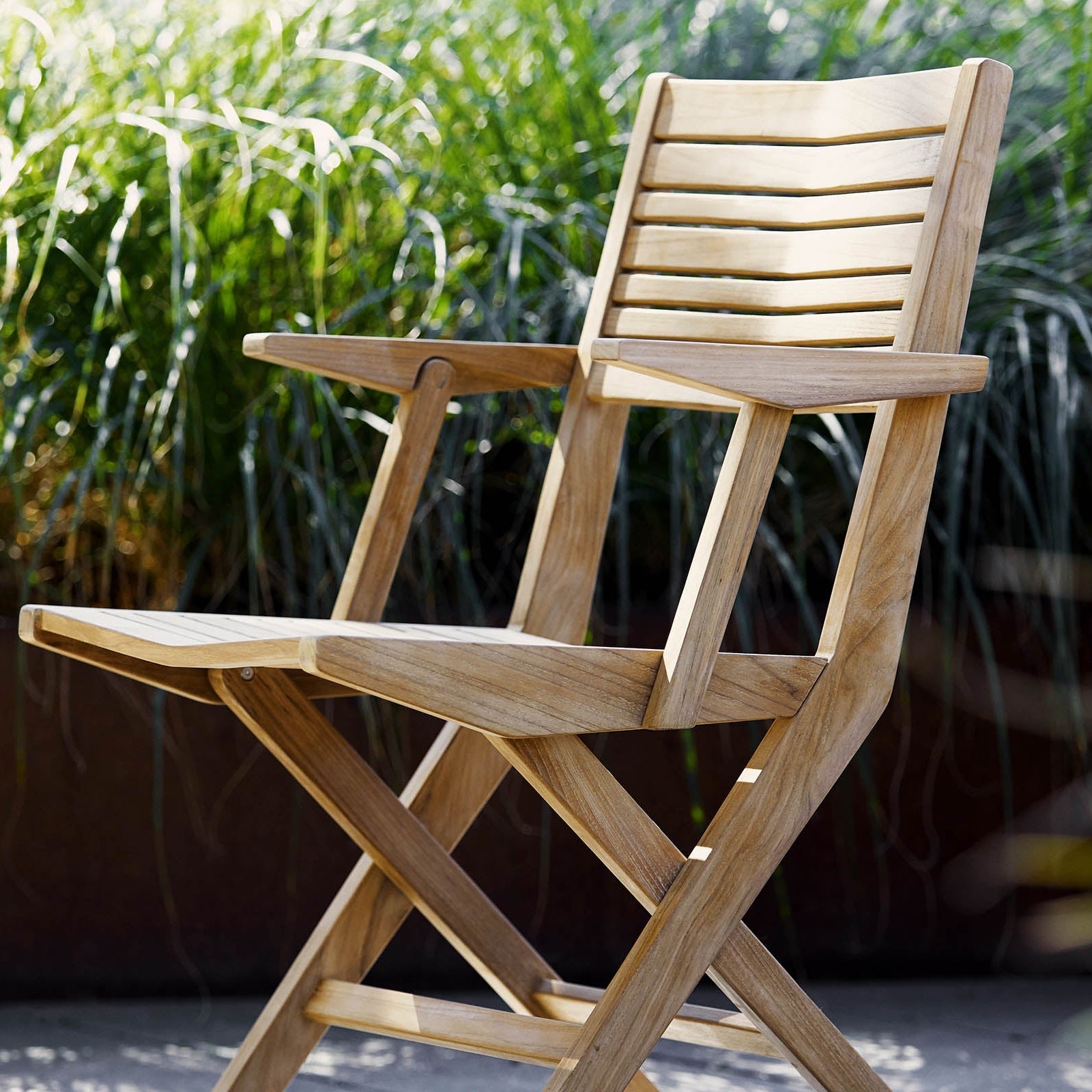 Cane-line folding wooden armchair, sustainable outdoor furniture for patio by Comosum