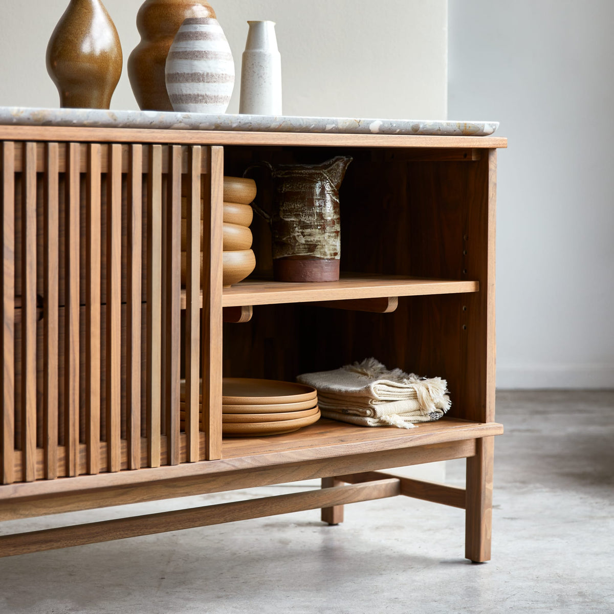 Tikamoon Isaure walnut sideboard, overhead view of the case and base