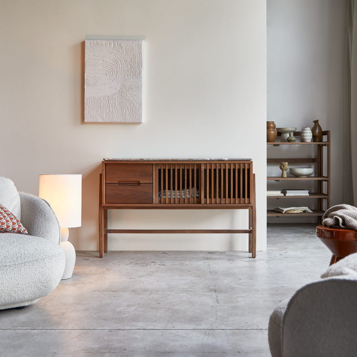 Tikamoon Isaure console table in solid walnut with terrazzo top, angled view