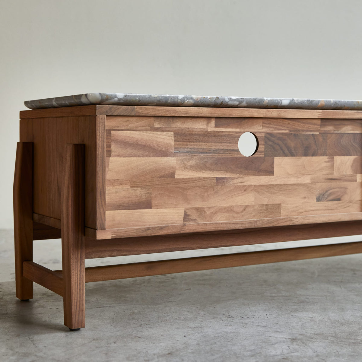 Tikamoon Isaure TV stand in solid walnut with a terrazzo top, detail of the drawer
