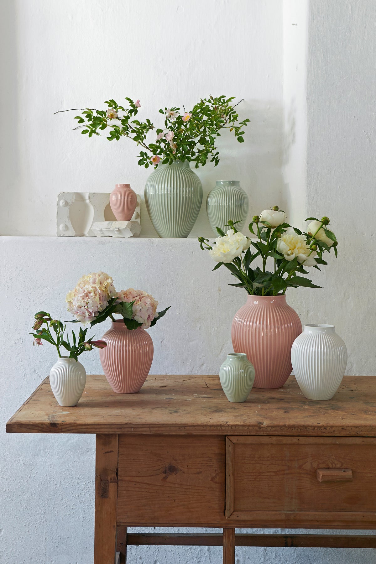 Knabstrup ripple vases in several glazes, styled in an interior setting, glazed earthenware