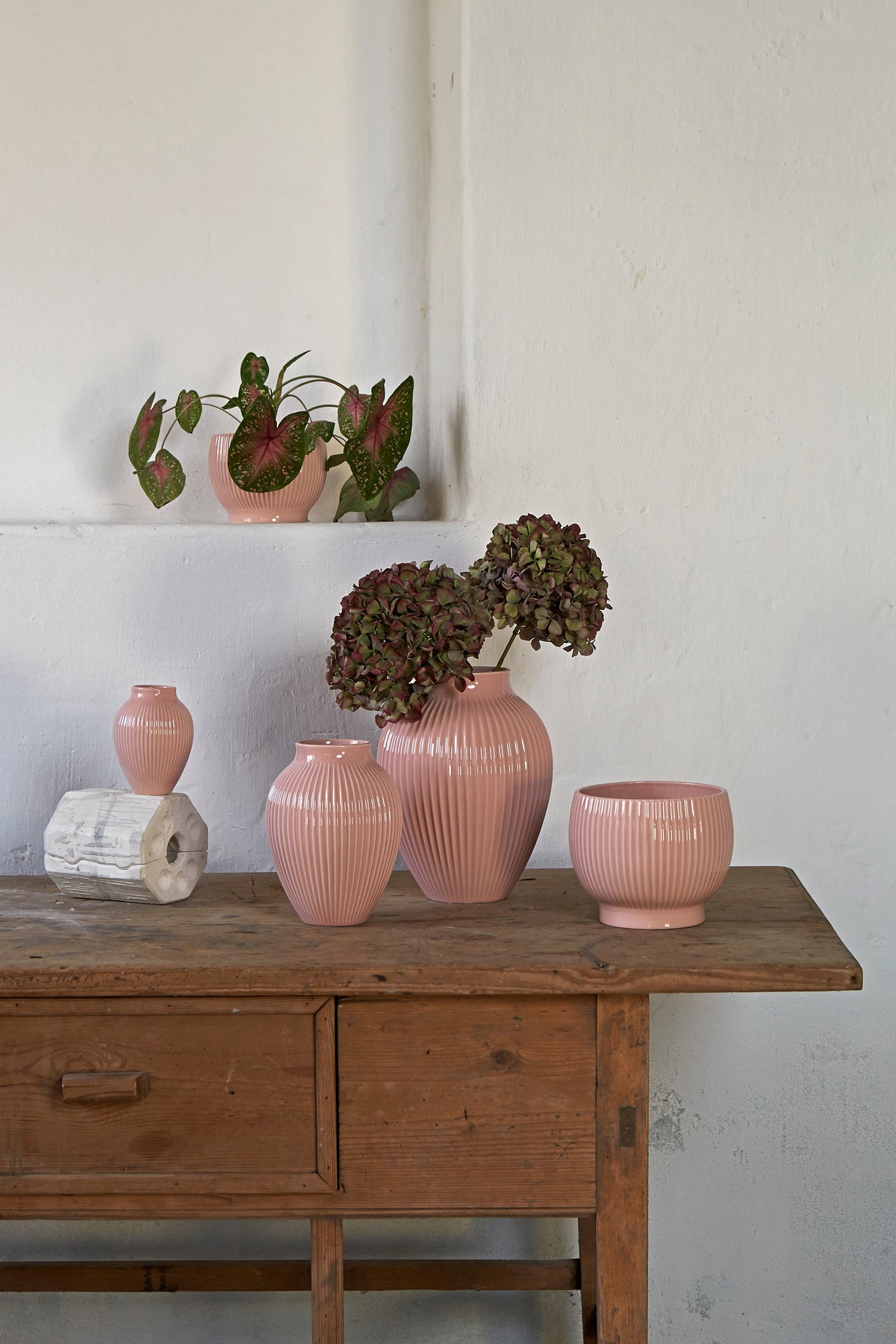 Knabstrup ripple flowerpots in several glazes, styled in an interior setting, glazed earthenware